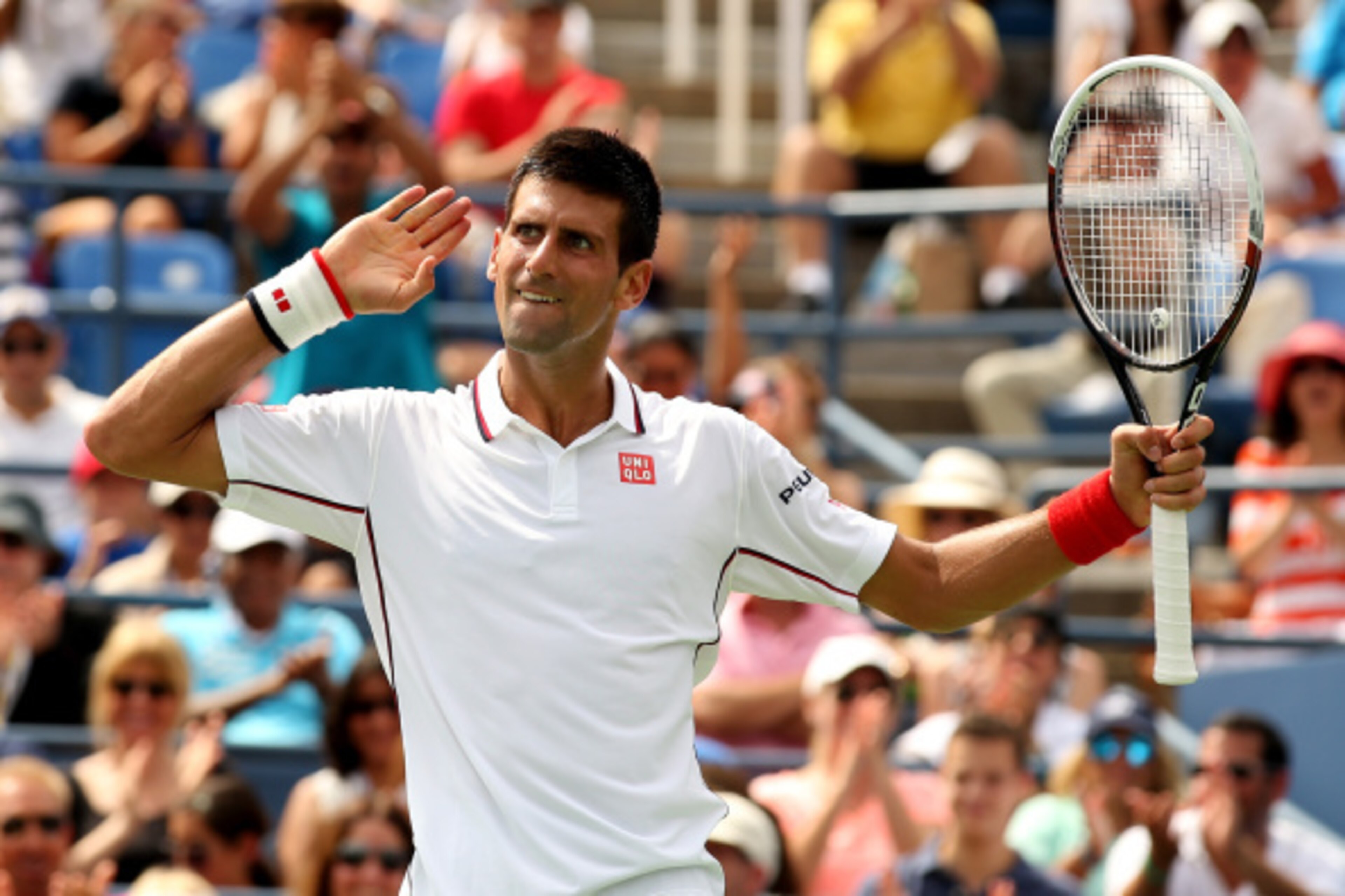 NEW YORK, NY - SEPTEMBER 01:  Novak Djokovic of Serbia reacts after a point against Philipp Kohlschreiber of Germany during their men's singles fourth round match on Day Eight of the 2014 US Open at the USTA Billie Jean King National Tennis Center on Sept