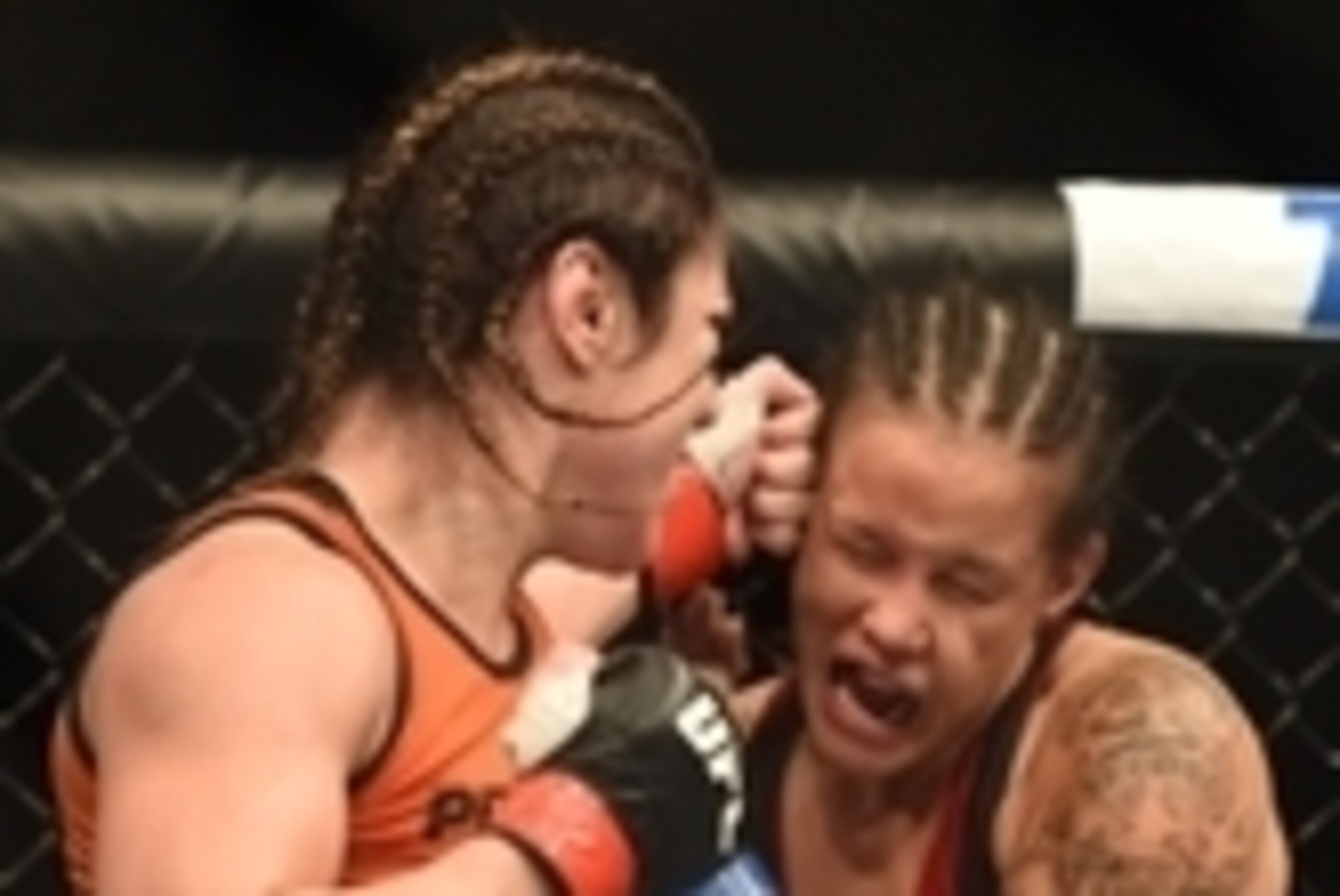 August 30, 2014; Sacramento, CA, USA; Bethe Correia (red gloves) fights against Shayna Baszler (blue gloves) during the women   s bantamweight bout of UFC 177 at Sleep Train Arena. Mandatory Credit: Kyle Terada-USA TODAY Sports