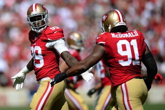SAN FRANCISCO, CA - SEPTEMBER 22:  Aldon Smith #99 and Ray McDonald #91 congratulates each other after they sacked Andrew Luck quarterback of the Indianapolis Colts during the first quarter at Candlestick Park on September 22, 2013 in San Francisco, Calif
