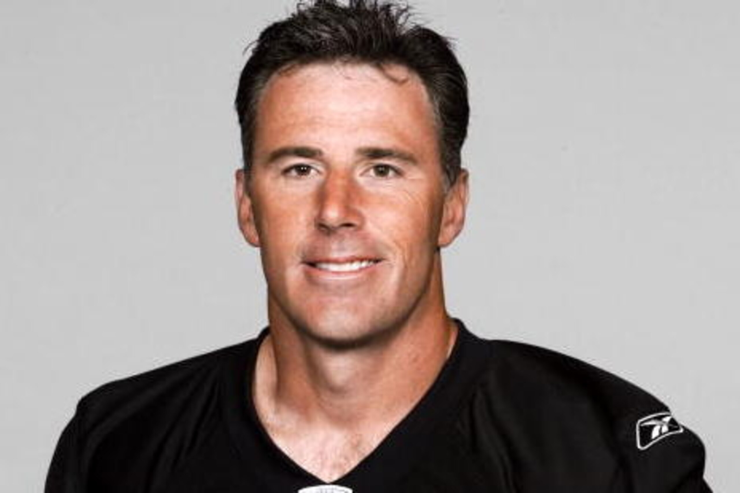 OAKLAND, CA - 2005: Rich Gannon #12 of the Oakland Raiders poses for his 2005 NFL headshot at photo day in Oakland, California.  (Photo by Getty Images)