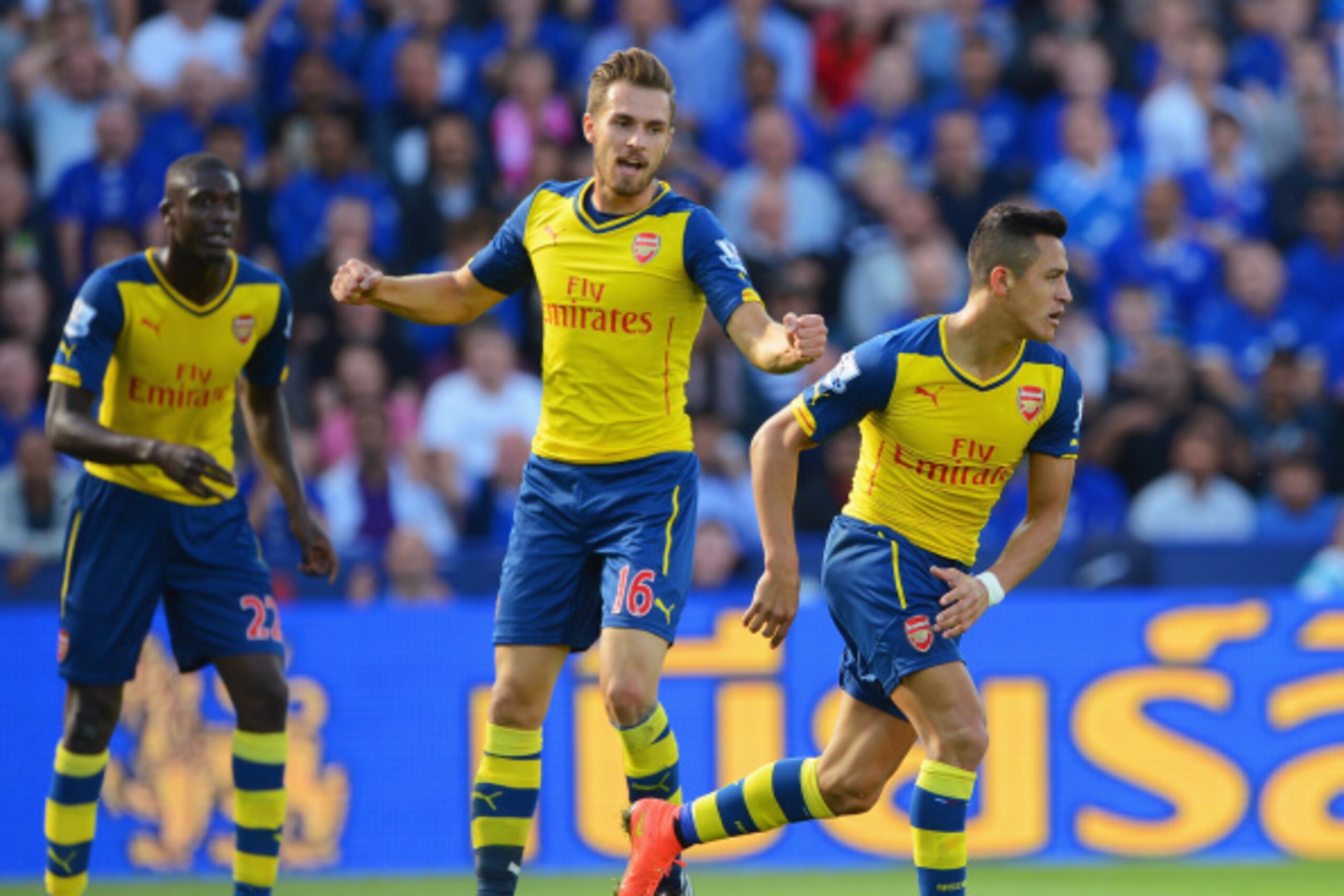 LEICESTER, ENGLAND - AUGUST 31:  Alexis Sanchez (R) of Arsenal celebrates scoring his team's opening goal with Aaron Ramsey during the Barclays Premier League match between Leicester City and Arsenal at The King Power Stadium on August 31, 2014 in Leicest