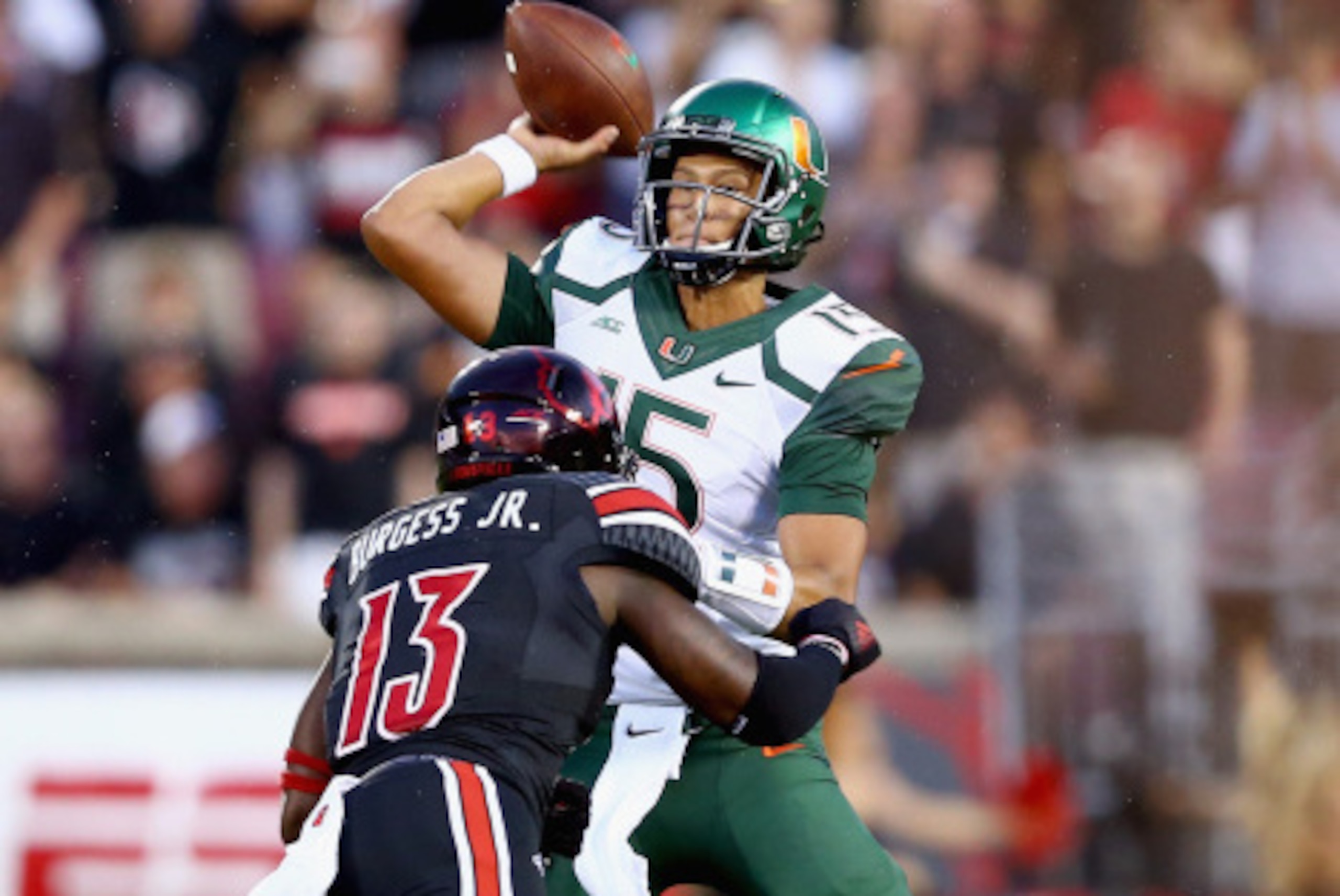 LOUISVILLE, KY - SEPTEMBER 01:  Brad Kaaya #15 of the Miami Huricanes throws a pass during the game against the Louisville Cardinals at Papa John's Cardinal Stadium on September 1, 2014 in Louisville, Kentucky.  (Photo by Andy Lyons/Getty Images)