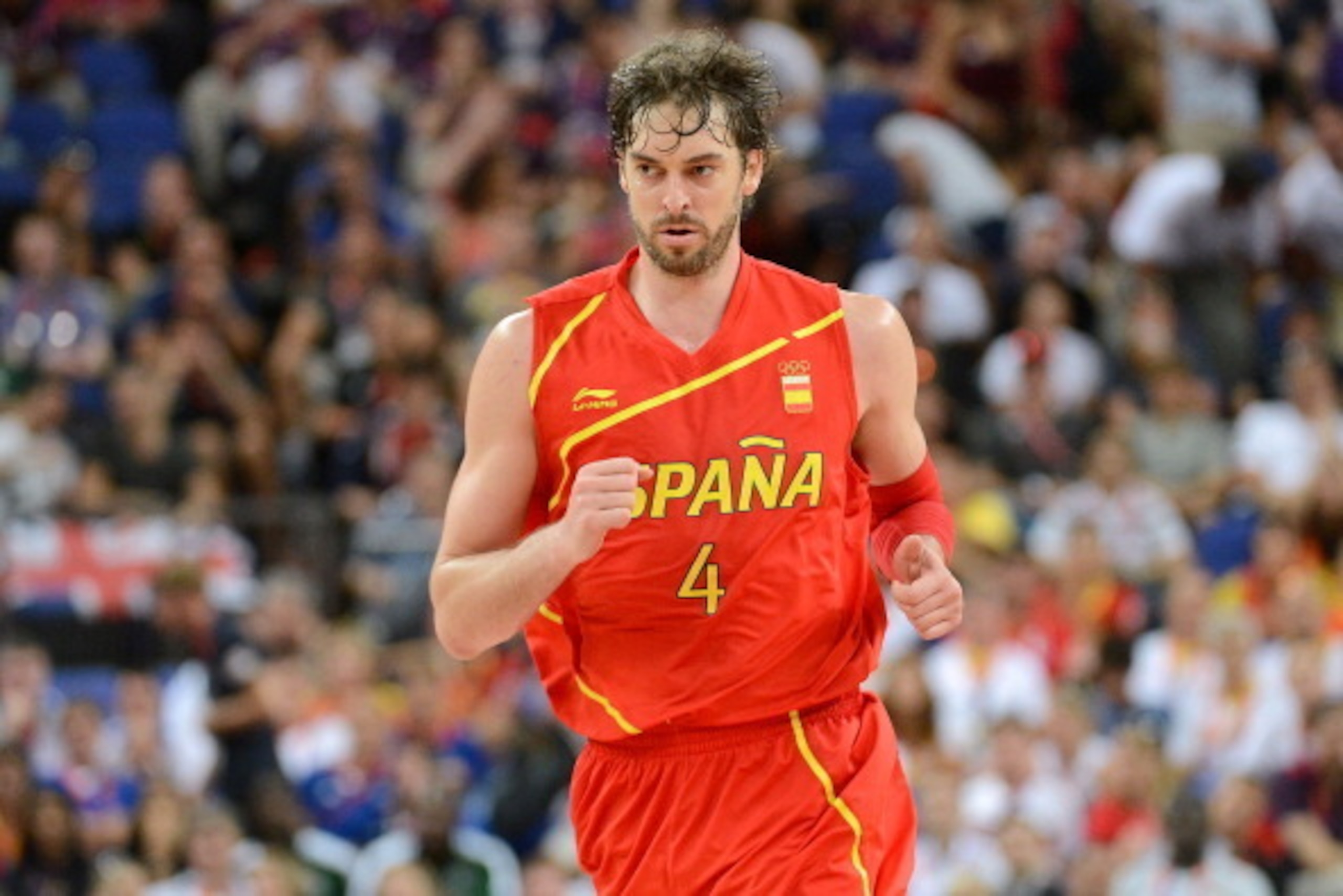 LONDON, ENGLAND - AUGUST 12:  Pau Gasol #4 of Spain celebrates making a shot during the Men's Basketball gold medal game between the United States and Spain on Day 16 of the London 2012 Olympics Games at North Greenwich Arena on August 12, 2012 in London,