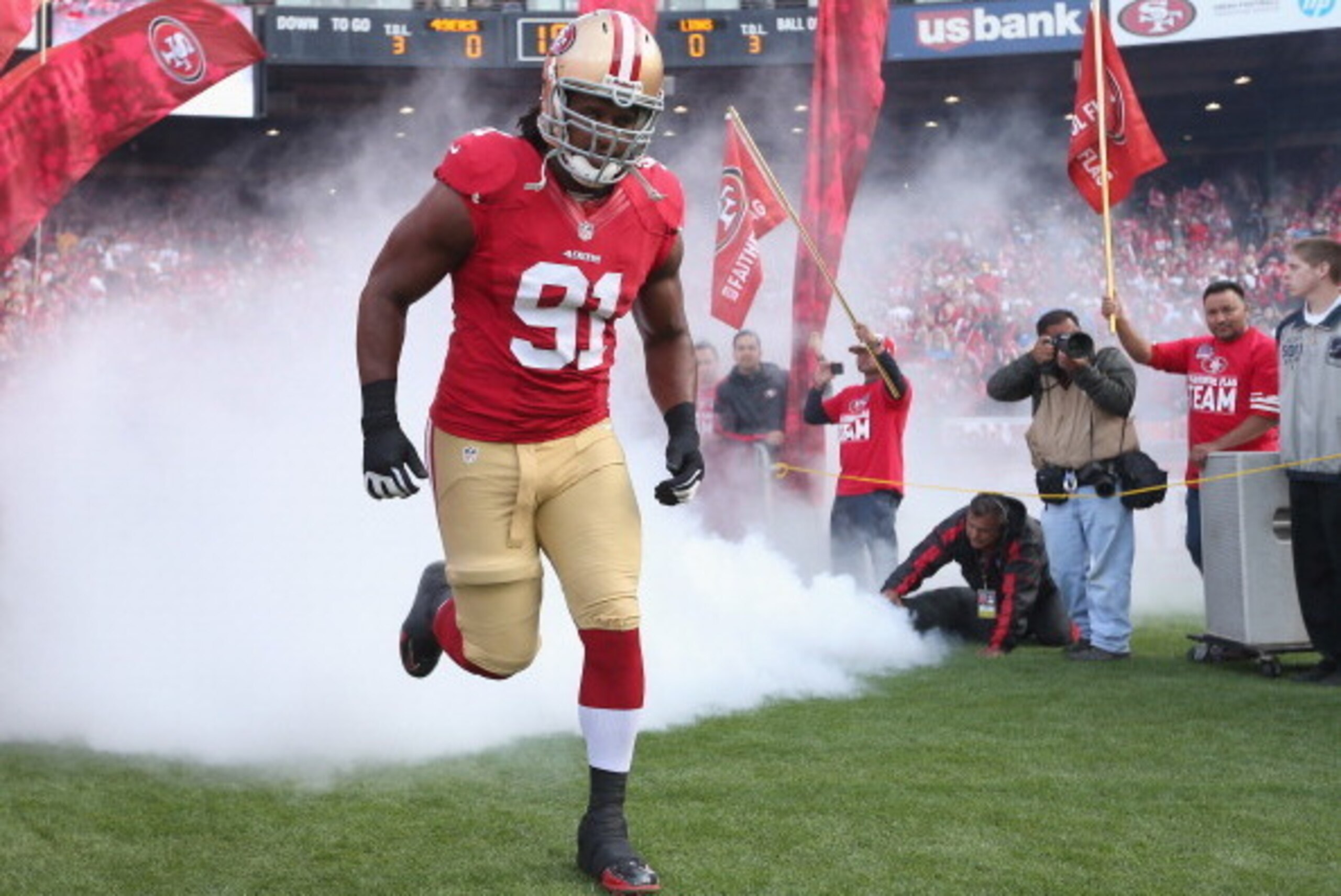 SAN FRANCISCO, CA - SEPTEMBER 16: Ray McDonald #91 of the San Francisco 49ers runs onto the field for their game against the Detroit Lions at Candlestick Park on September 16, 2012 in San Francisco, California.  (Photo by Ezra Shaw/Getty Images)