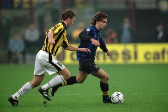 26 Oct 2000:  Andrea Pirlo of Inter Milan beats Michael Kreek of Vitesse Arnhem during the UEFA Cup second round first leg match played at the San Siro, in Milan, Italy. The match ended in a 0-0 draw. \ Mandatory Credit: Stuart Franklin /Allsport