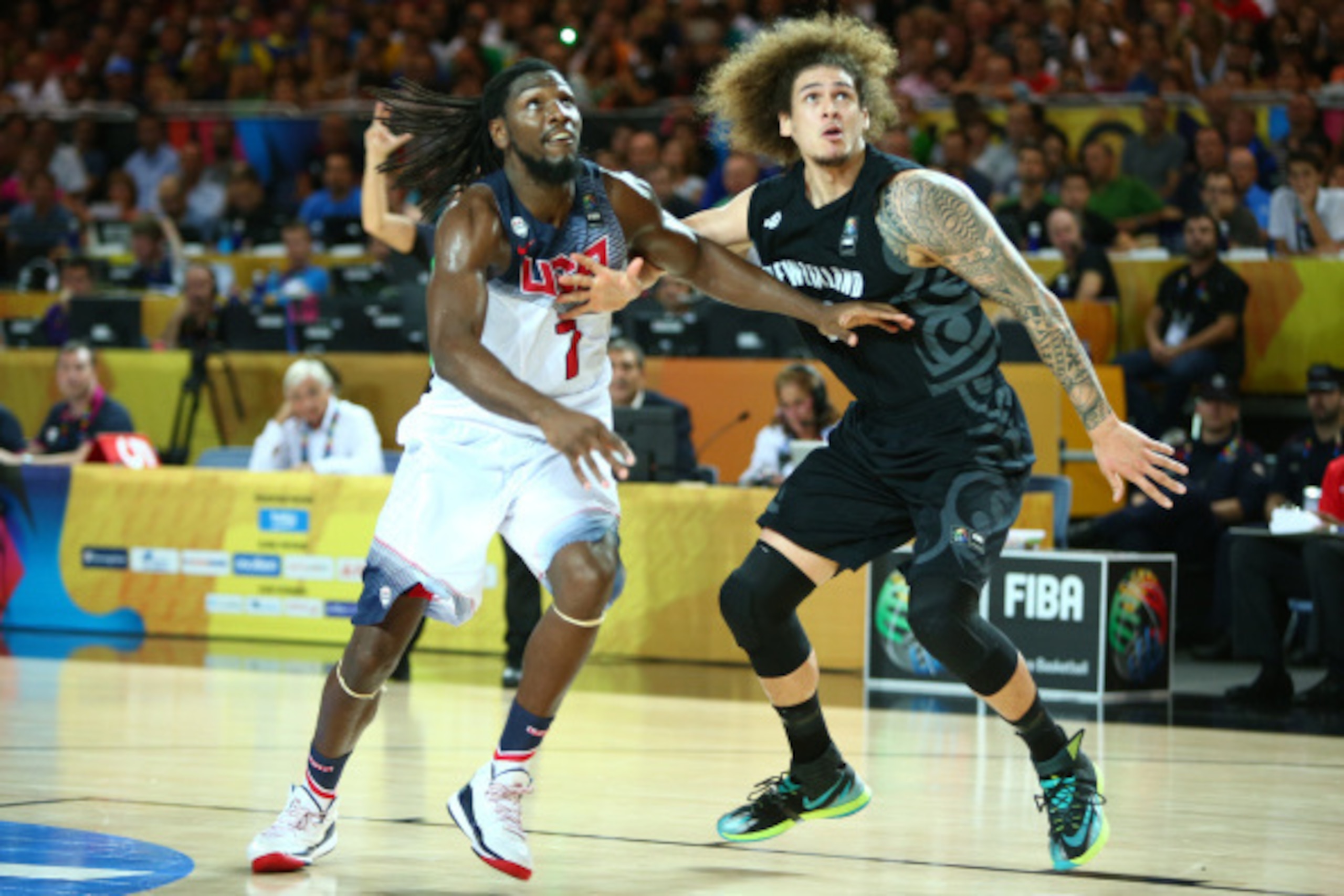 BILBAO, SPAIN - SEPTEMBER 2: Kenneth Faried #7 of the USA Basketball Men's National Team boxes out against Isaac Fotu #12 of the New Zealand Basketball Men's National Team during the 2014 FIBA World Cup at Bizkaia Arena in Bilbao Exhibition Centre on Sept