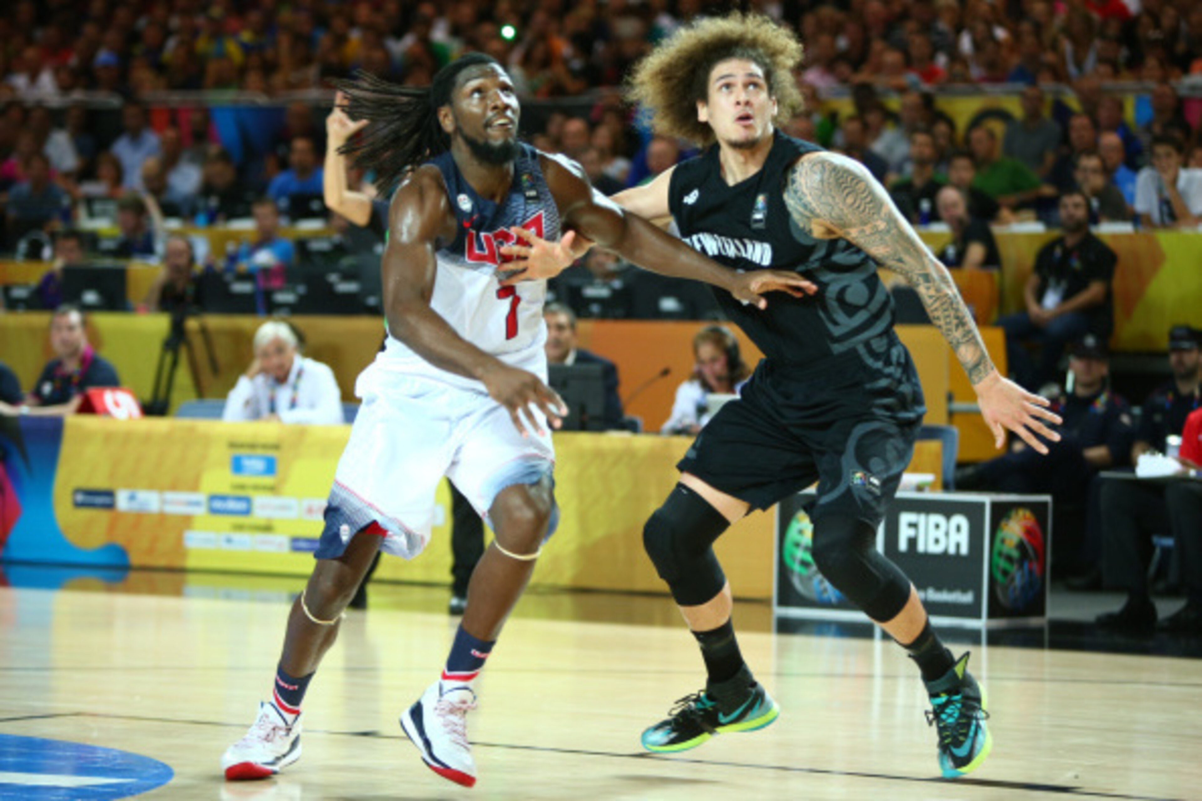 BILBAO, SPAIN - SEPTEMBER 2: Kenneth Faried #7 of the USA Basketball Men's National Team boxes out against Isaac Fotu #12 of the New Zealand Basketball Men's National Team during the 2014 FIBA World Cup at Bizkaia Arena in Bilbao Exhibition Centre on Sept
