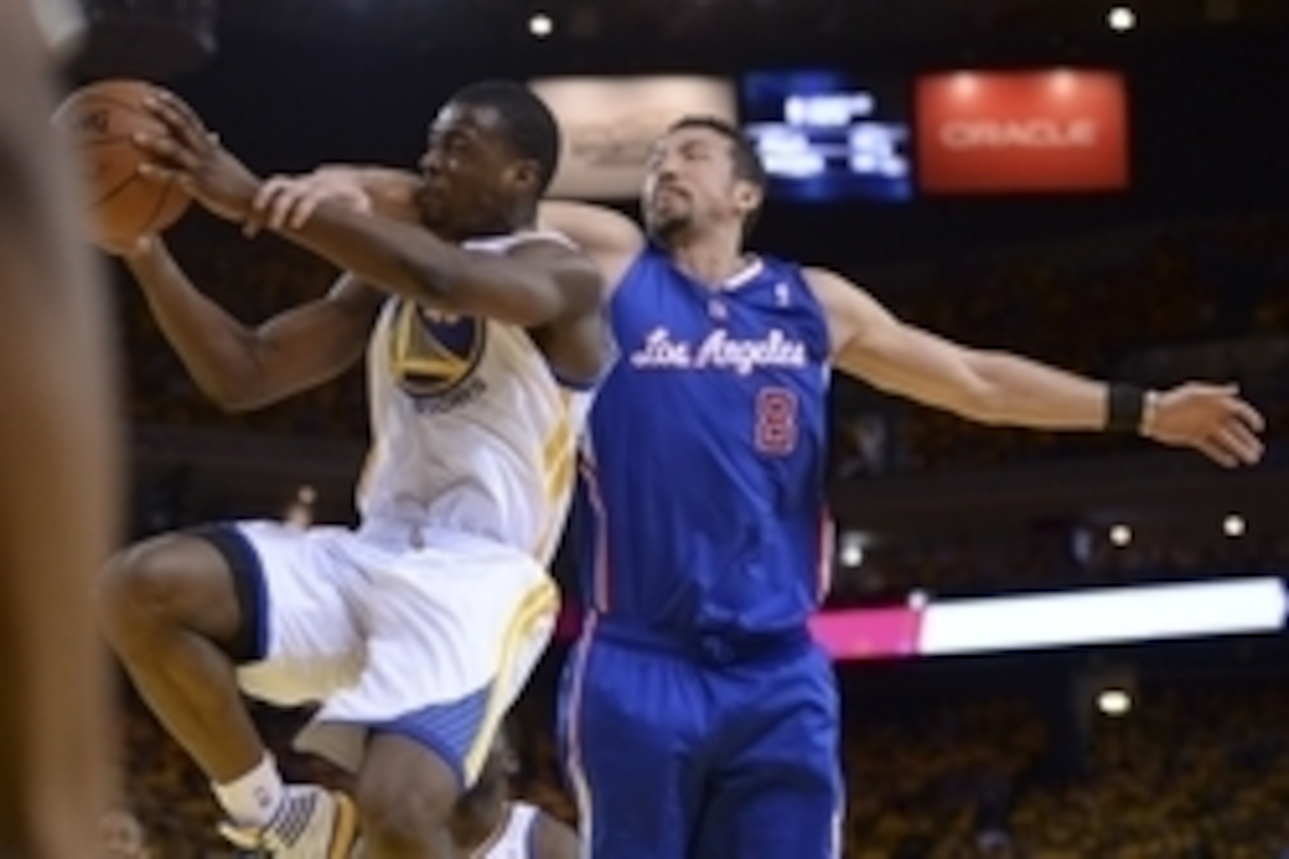 Apr 27, 2014; Oakland, CA, USA; Golden State Warriors forward Harrison Barnes (40) is fouled by Los Angeles Clippers forward Hedo Turkoglu (8) for a flagrant-1 call during the fourth quarter in game four of the first round of the 2014 NBA Playoffs at Orac