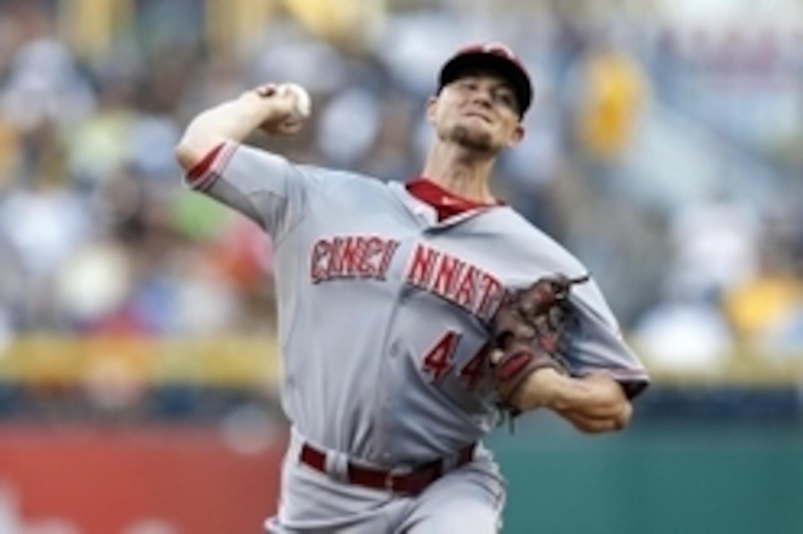 Aug 29, 2014; Pittsburgh, PA, USA; Cincinnati Reds starting pitcher Mike Leake (44) delivers a pitch against the Pittsburgh Pirates during the first inning at PNC Park. Mandatory Credit: Charles LeClaire-USA TODAY Sports