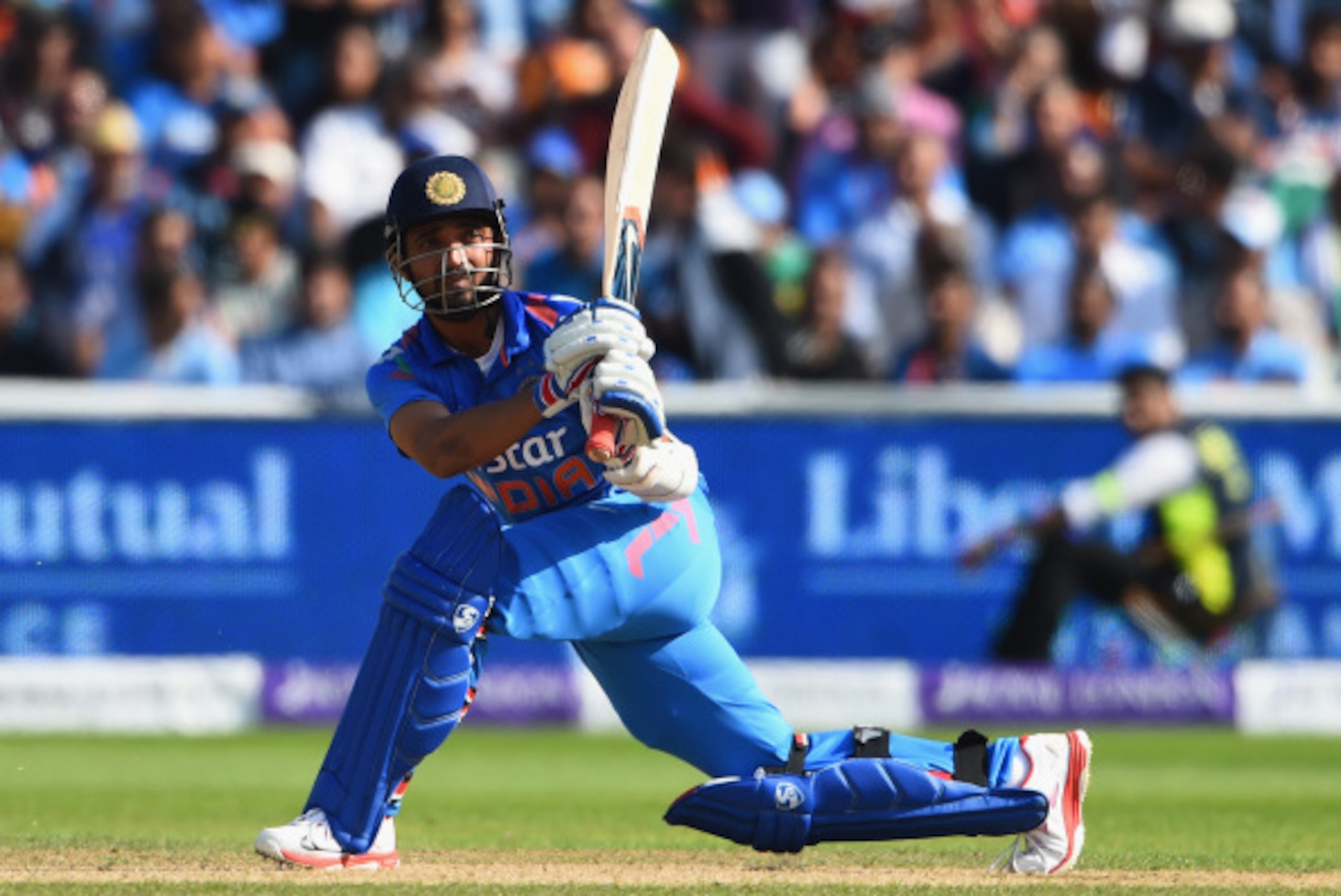 BIRMINGHAM, ENGLAND - SEPTEMBER 02:  Ajinka Rahane of India reaches 50 during the 4th Royal London One-Day International match between England and India at Edgbaston on September 2, 2014 in Birmingham, England.  (Photo by Shaun Botterill/Getty Images)