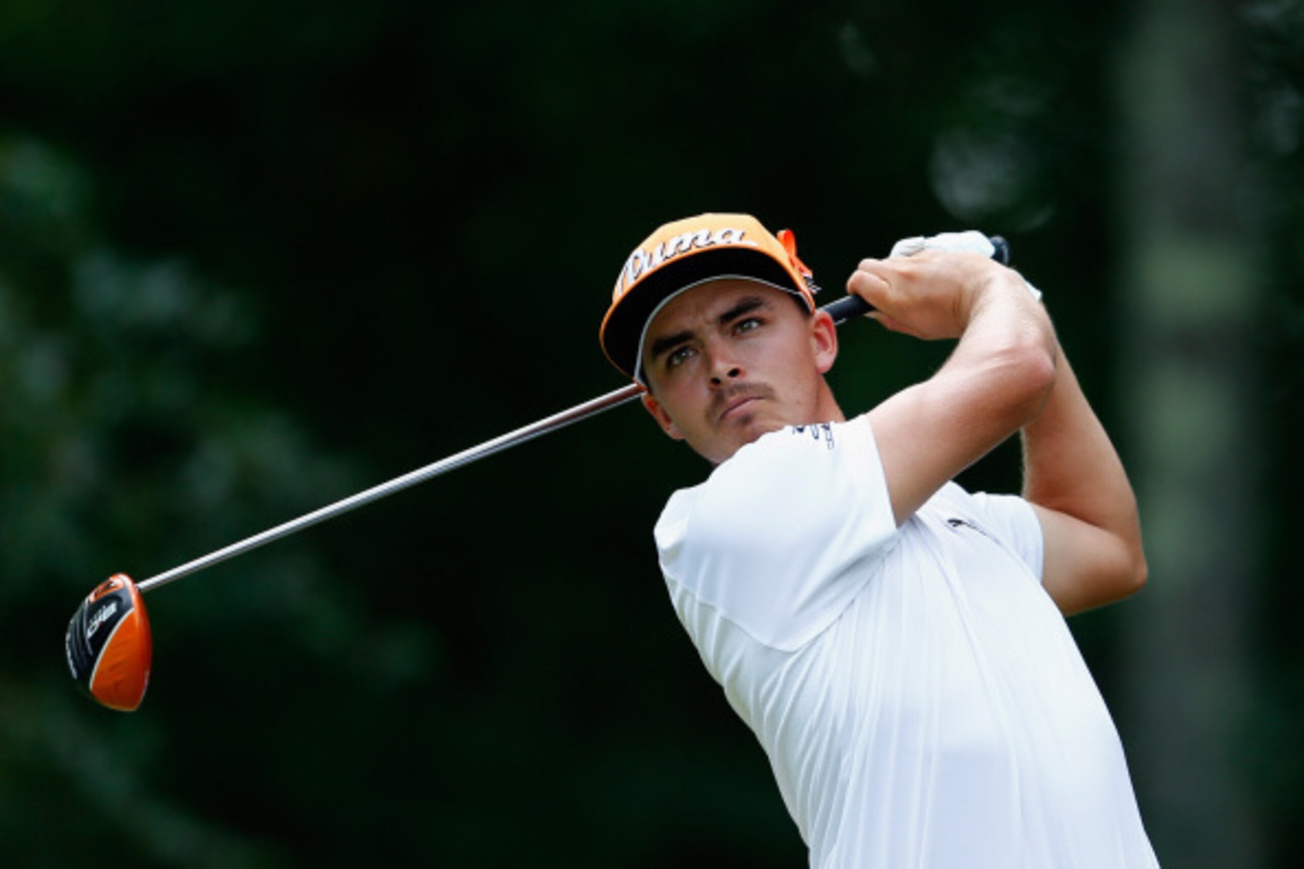 NORTON, MA - SEPTEMBER 01:  Rickie Fowler tees off on the first hole during the final round of the Deutsche Bank Championship at the TPC Boston on September 1, 2014 in Norton, Massachusetts.  (Photo by Jim Rogash/Getty Images)