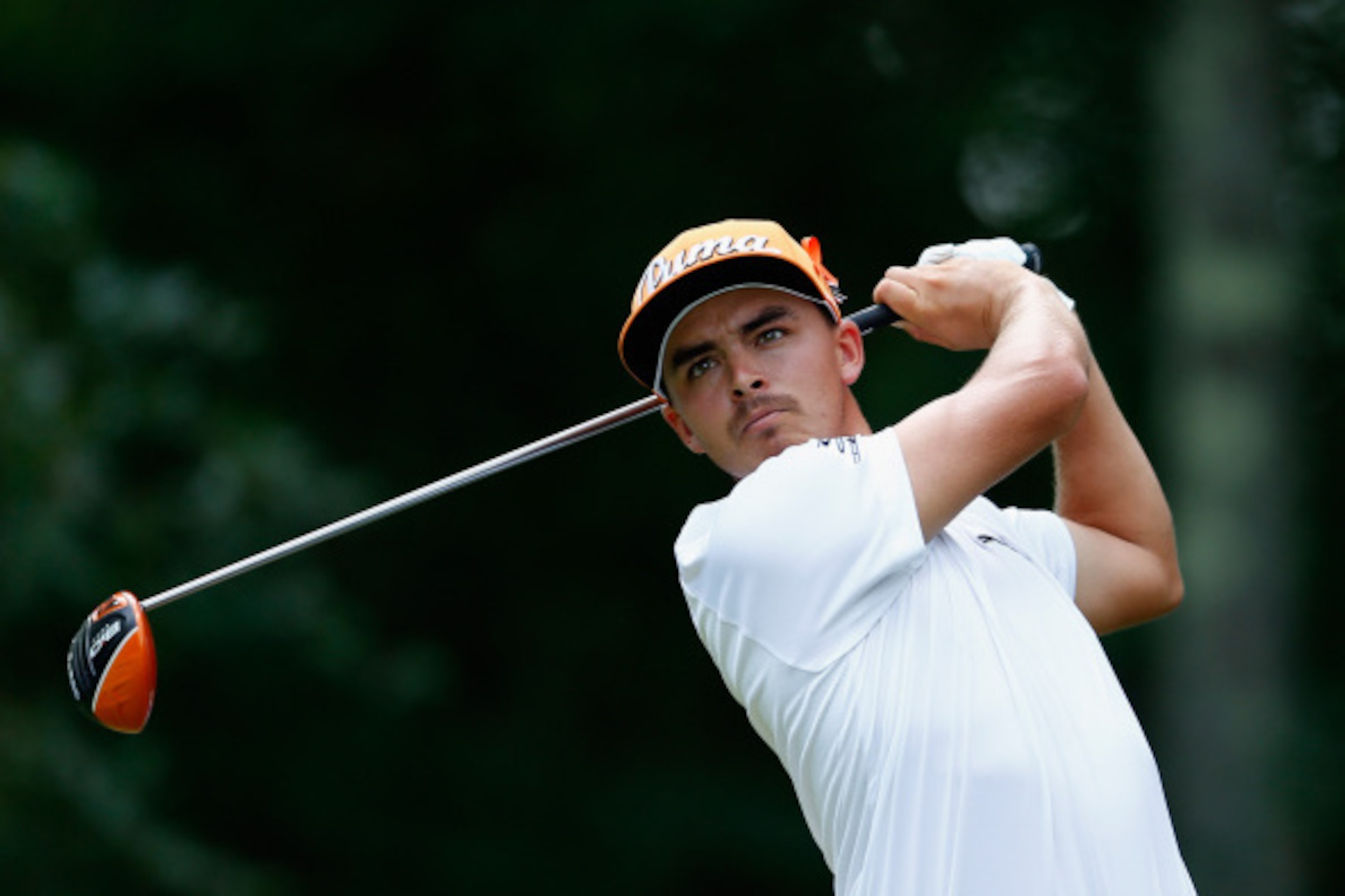 NORTON, MA - SEPTEMBER 01:  Rickie Fowler tees off on the first hole during the final round of the Deutsche Bank Championship at the TPC Boston on September 1, 2014 in Norton, Massachusetts.  (Photo by Jim Rogash/Getty Images)