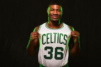 TARRYTOWN, NY - AUGUST 3:  Marcus Smart #36 of the Boston Celtics poses for a portrait during the 2014 NBA rookie photo shoot on August 3, 2014 at the Madison Square Garden Training Facility in Tarrytown, New York. NOTE TO USER: User expressly acknowledge