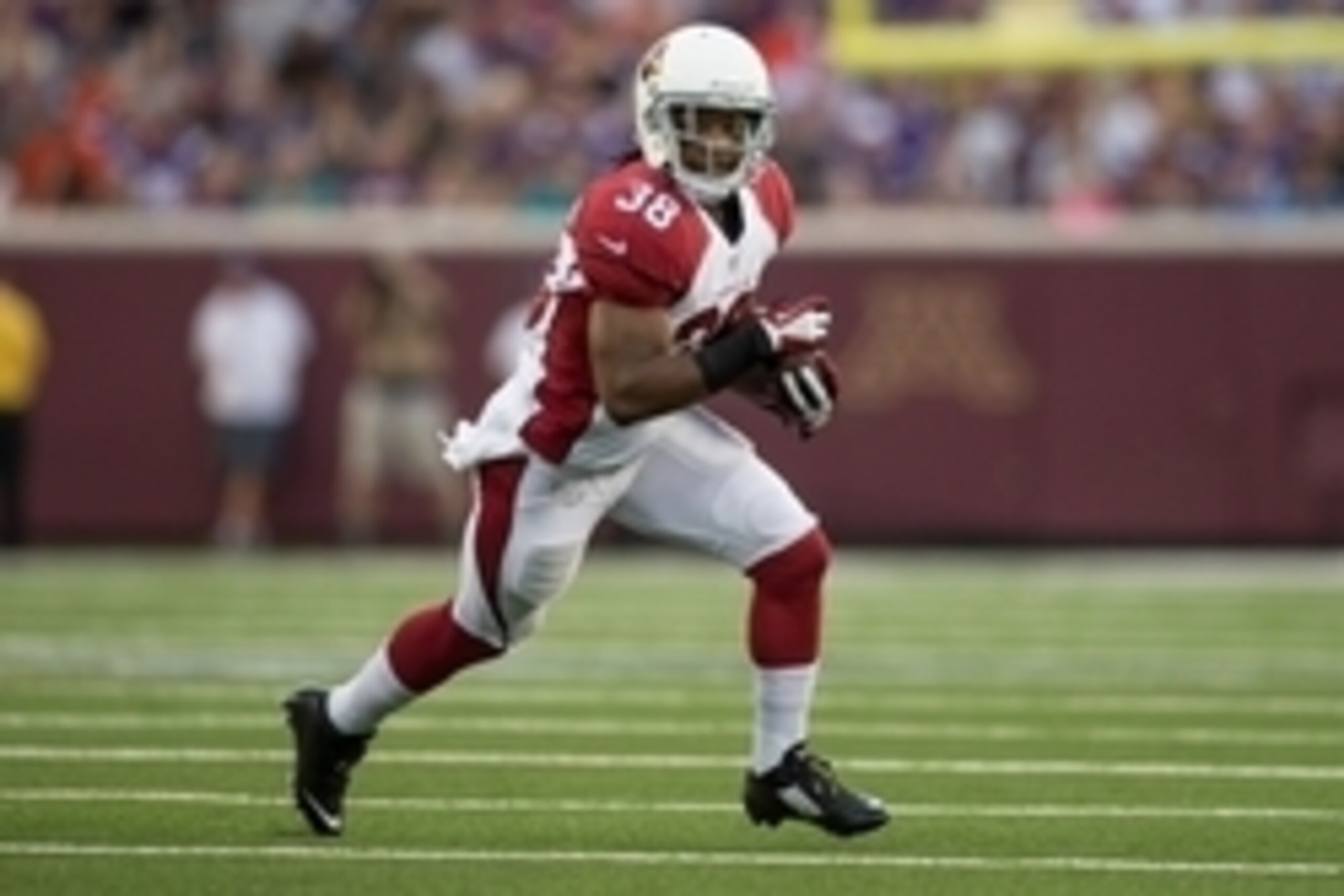 Aug 16, 2014; Minneapolis, MN, USA; Arizona Cardinals running back Andre Ellington (38) rushes against the Minnesota Vikings in the first quarter at TCF Bank Stadium. Mandatory Credit: Bruce Kluckhohn-USA TODAY Sports