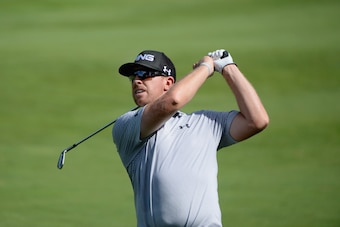 NORTON, MA - SEPTEMBER 01:  Hunter Mahan takes his second shot on the 12th hole during the final round of the Deutsche Bank Championship at the TPC Boston on September 1, 2014 in Norton, Massachusetts.  (Photo by Ross Kinnaird/Getty Images)