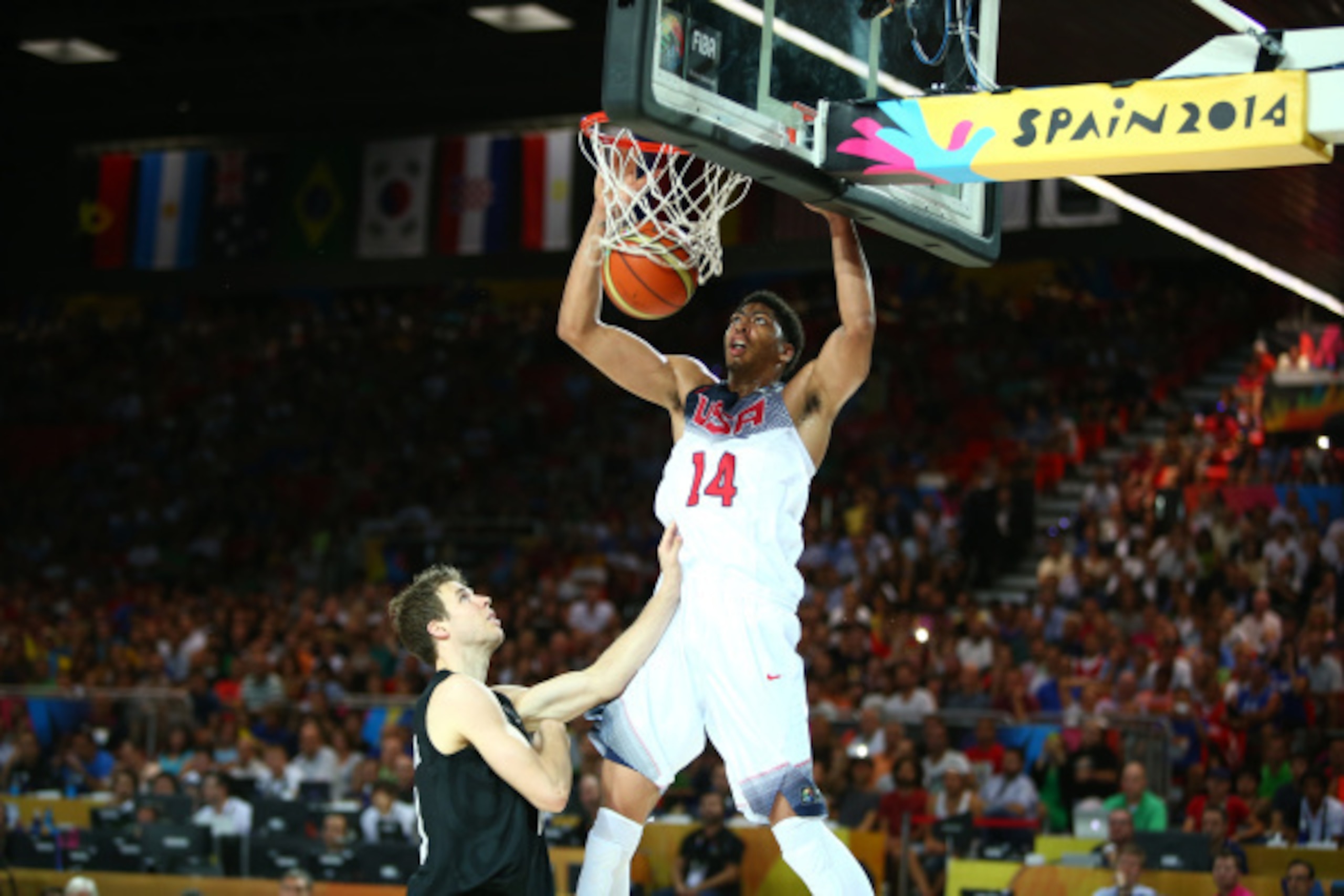 BILBAO, SPAIN - SEPTEMBER 2: Anthony Davis #14 of the USA Basketball Men's National Team dunks during a game against the New Zealand Basketball Men's National Team during the 2014 FIBA World Cup at Bizkaia Arena in Bilbao Exhibition Centre on September 2,