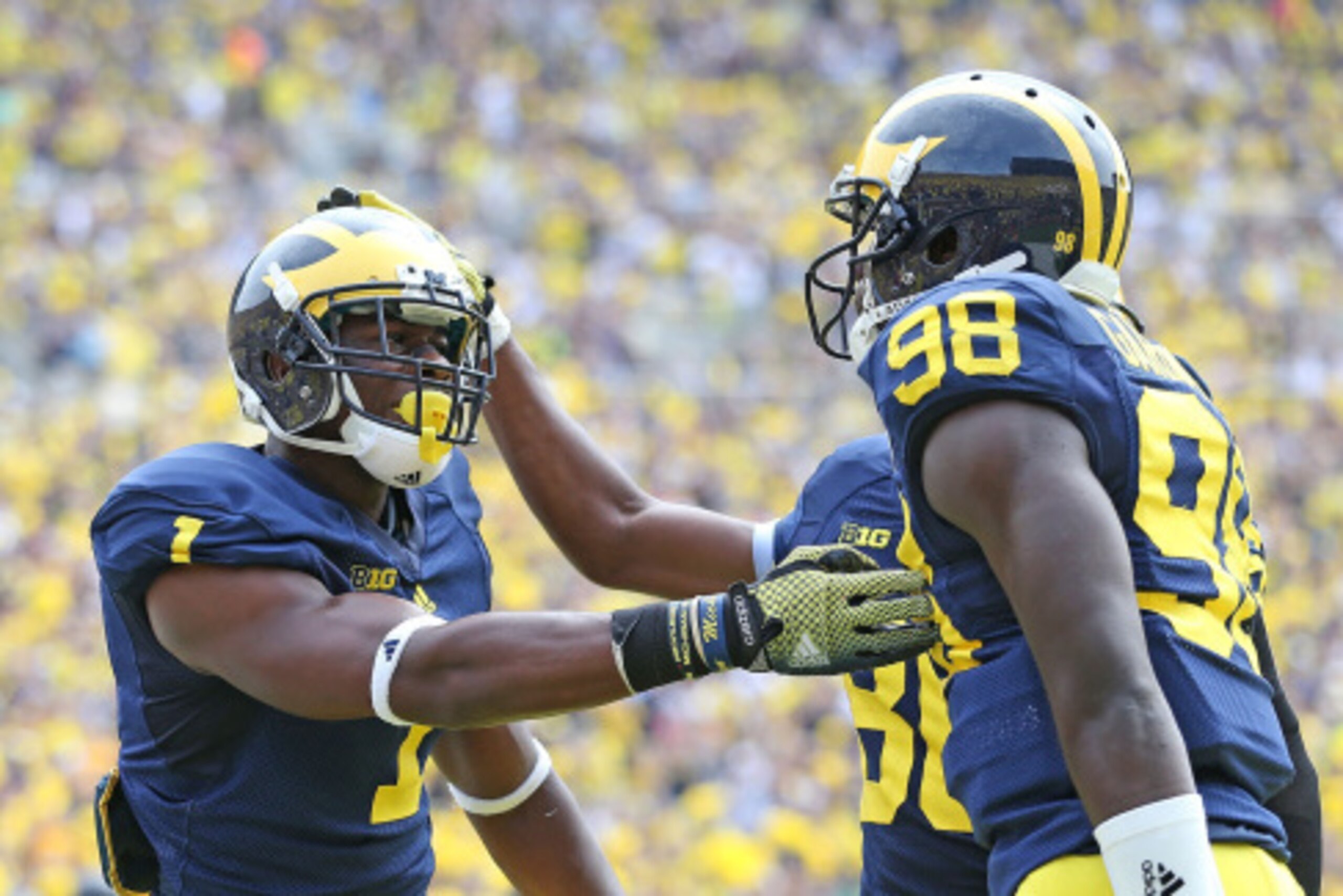 ANN ARBOR, MI - AUGUST 30: Devin Funchess #1 of the Michigan Wolverines scores a first half touchdown and celebrates with quarterback Devin Gardner #98 during the first half of the game against Appalachian State at Michigan Stadium on August 30, 2014 in A ANN ARBOR, MI - AUGUST 30: Devin Funchess #1 of the Michigan Wolverines scores a first half touchdown and celebrates with quarterback Devin Gardner #98 during the first half of the game against Appalachian State at Michigan Stadium on August 30, 2014 in A