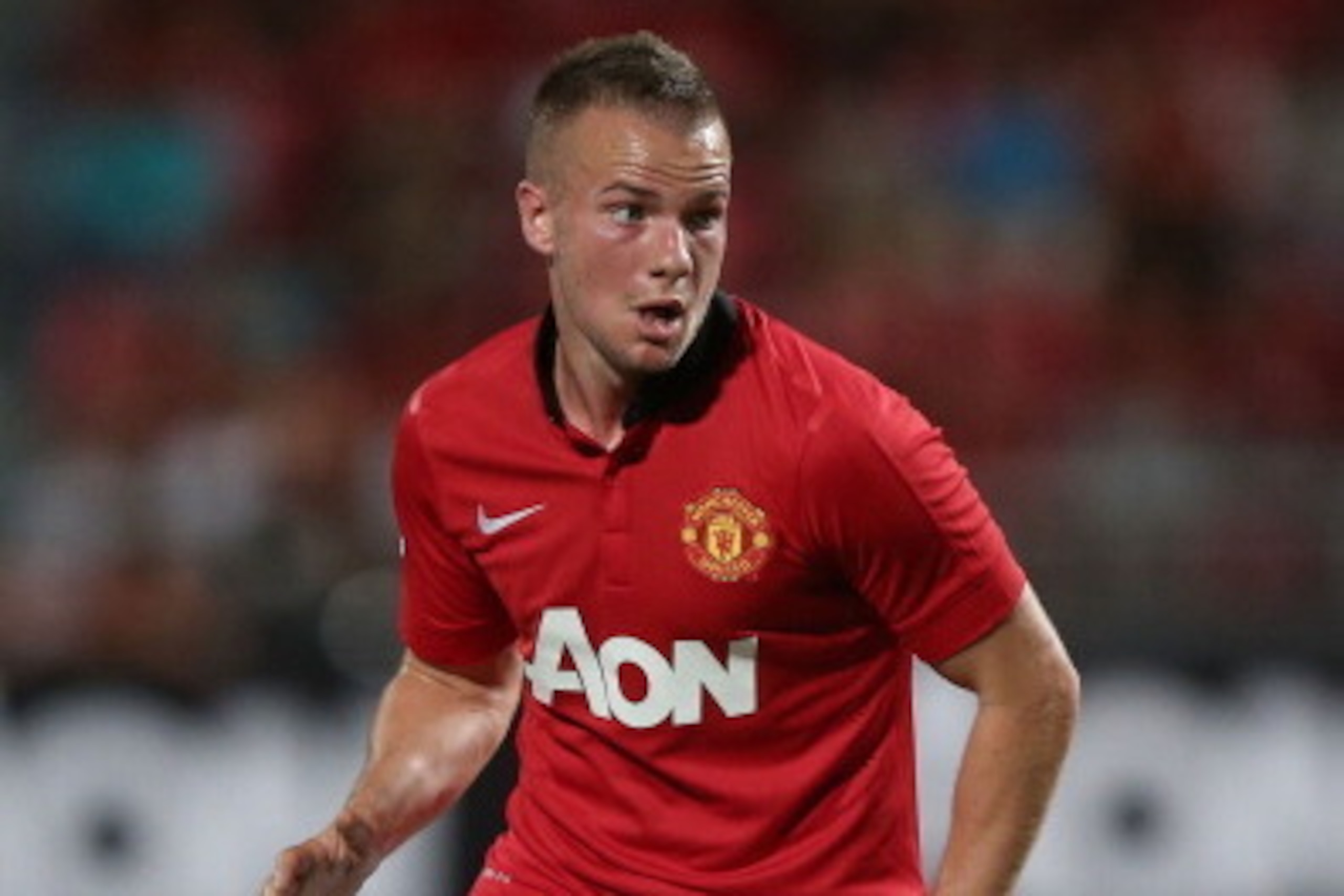 BANGKOK, THAILAND - JULY 13: Tom Cleverley #23 of Manchester United looks to pass during the friendly match between Singha All Star XI and Manchester United at Rajamangala Stadium on July 13, 2013 in Bangkok, Thailand. (Photo by Chris McGrath/Getty Imag BANGKOK, THAILAND - JULY 13: Tom Cleverley #23 of Manchester United looks to pass during the friendly match between Singha All Star XI and Manchester United at Rajamangala Stadium on July 13, 2013 in Bangkok, Thailand. (Photo by Chris McGrath/Getty Imag