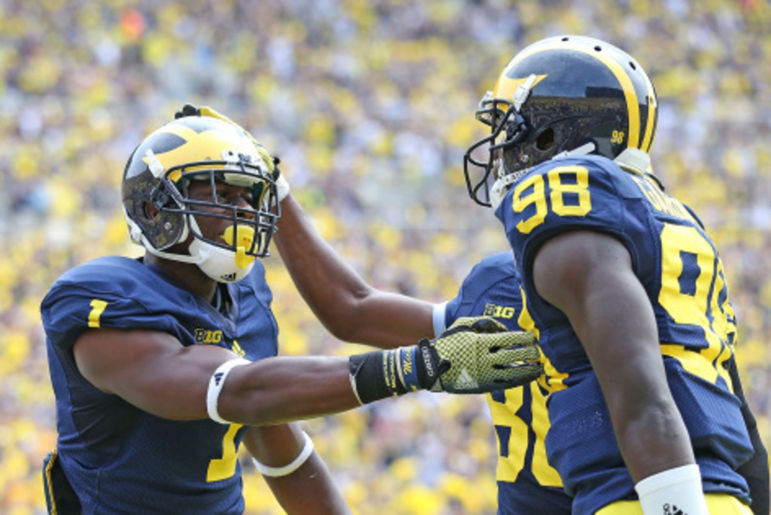 ANN ARBOR, MI - AUGUST 30: Devin Funchess #1 of the Michigan Wolverines scores a first half touchdown and celebrates with quarterback Devin Gardner #98 during the first half of the game against Appalachian State at Michigan Stadium on August 30, 2014 in A