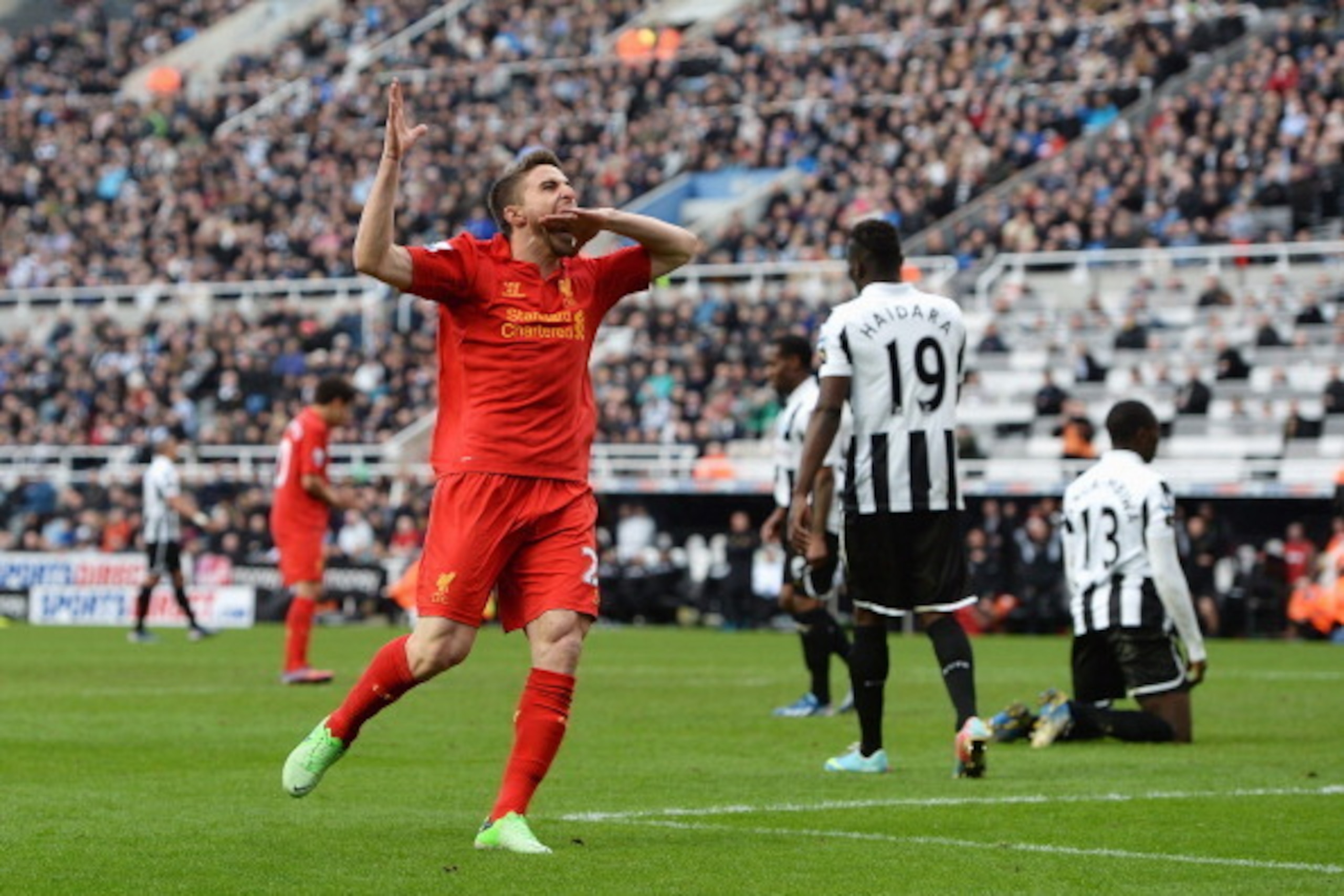 NEWCASTLE UPON TYNE, ENGLAND - APRIL 27: Fabio Borini of Liverpool celebrates scoring the fifth Liverpool goal during the Barclays Premier League match between Newcastle United and Liverpool at St James' Park on April 27, 2013 in Newcastle upon Tyne, Engl
