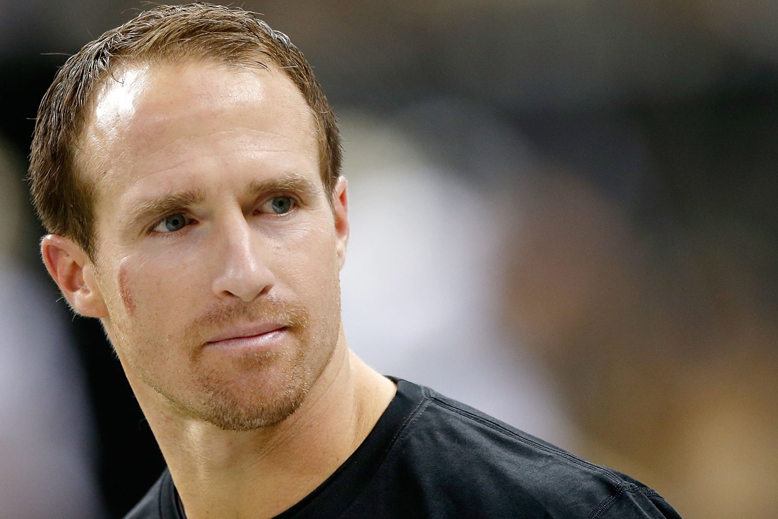 NEW ORLEANS, LA - AUGUST 15: Drew Brees #9 of the New Orleans Saints warms up on field before the start of the first preseason game between the New Orleans Saints and the Tennessee Titans at Mercedes-Benz Superdome on August 15, 2014 in New Orleans, Loui NEW ORLEANS, LA - AUGUST 15: Drew Brees #9 of the New Orleans Saints warms up on field before the start of the first preseason game between the New Orleans Saints and the Tennessee Titans at Mercedes-Benz Superdome on August 15, 2014 in New Orleans, Loui