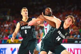 BILBAO, SPAIN - SEPTEMBER 2: Kenneth Faried #7 of the USA Basketball Men's National Team battles for position against Kirk Penney #6 and Rob Loe #14 of the New Zealand Basketball Men's National Team during the 2014 FIBA World Cup at Bizkaia Arena in Bilba