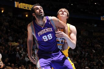 DENVER, CO - APRIL 17: Hamed Haddadi #98 of the Phoenix Suns waits for the rebound against the Denver Nuggets on April 17, 2013 at the Pepsi Center in Denver, Colorado. NOTE TO USER: User expressly acknowledges and agrees that, by downloading and/or using