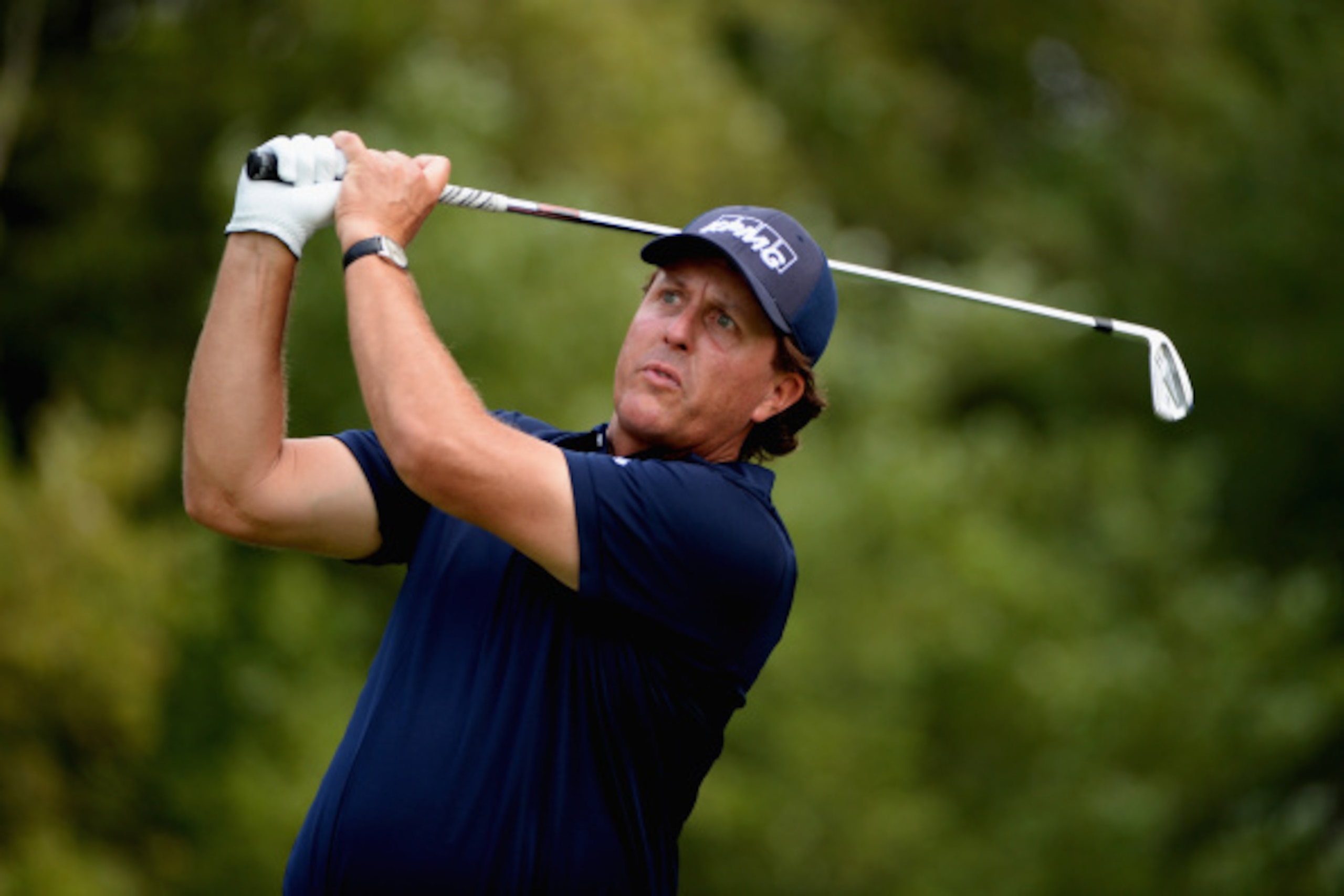 NORTON, MA - AUGUST 31: Phil Mickelson tees off on the fourth hole during the third round of the Deutsche Bank Championship at the TPC Boston on August 31, 2014 in Norton, Massachusetts. (Photo by Ross Kinnaird/Getty Images) NORTON, MA - AUGUST 31: Phil Mickelson tees off on the fourth hole during the third round of the Deutsche Bank Championship at the TPC Boston on August 31, 2014 in Norton, Massachusetts. (Photo by Ross Kinnaird/Getty Images)