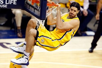 INDIANAPOLIS, IN - MAY 18:  Luis Scola #4 of the Indiana Pacers dunks against the Miami Heat during Game One of the Eastern Conference Finals of the 2014 NBA Playoffs at Bankers Life Fieldhouse on May 18, 2014 in Indianapolis, Indiana. NOTE TO USER: User 