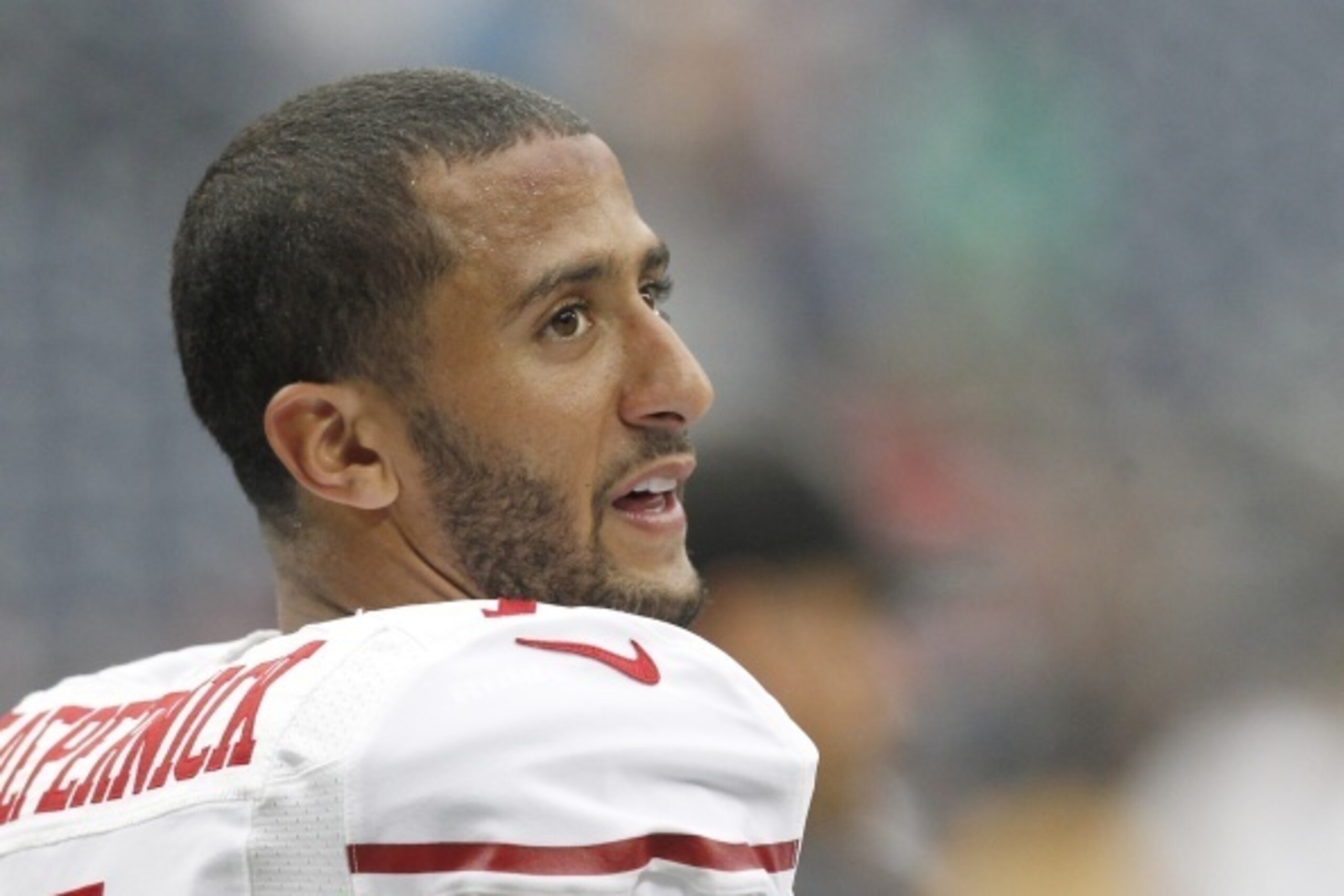 HOUSTON, TX- AUGUST 28: Colin Kaepernick #7 of the San Francisco 49ers in pre-game warm up before playing against the Houston Texans in a pre-season NFL game on August 28, 2014 at NRG Stadium in Houston, Texas. (Photo by Thomas B. Shea/Getty Images)