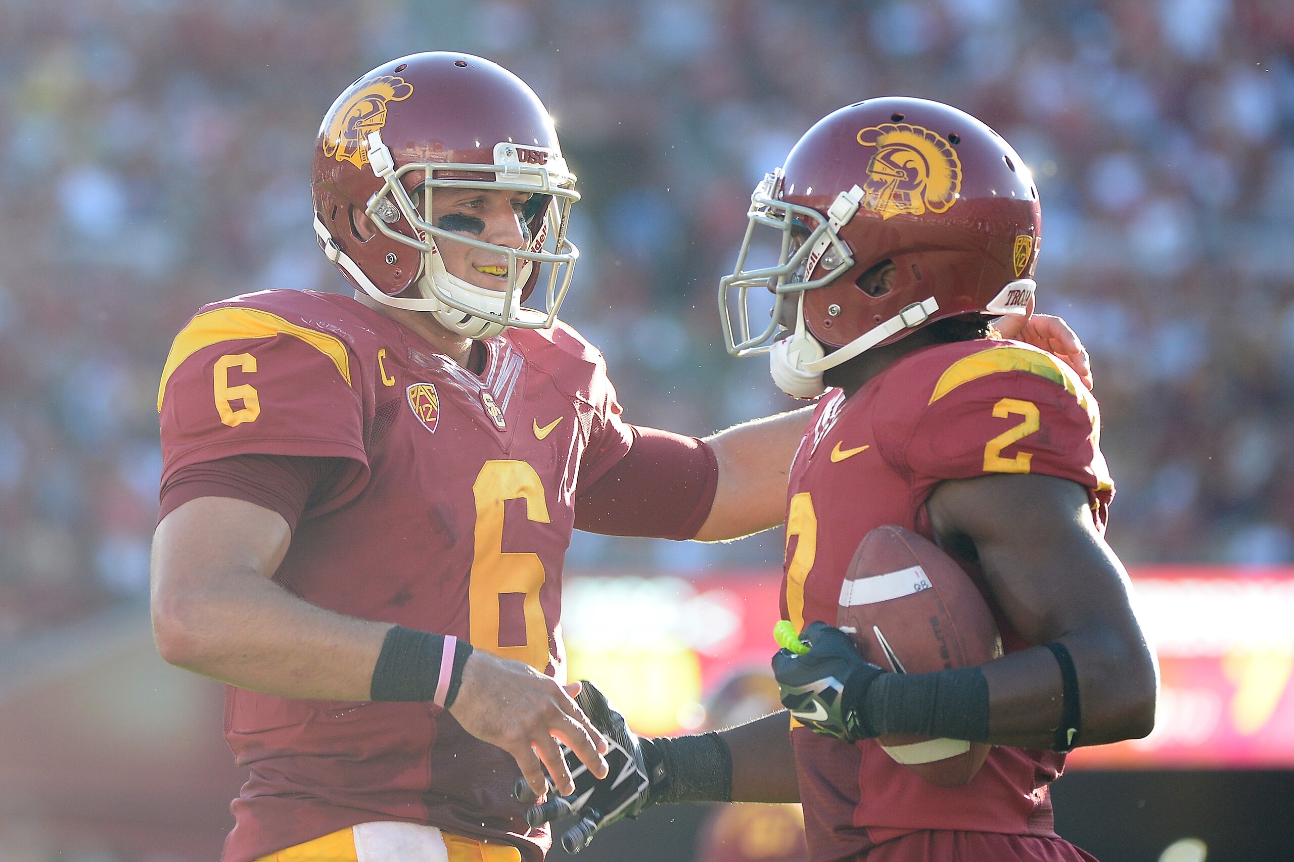LOS ANGELES, CA - AUGUST 30:  Quarterback Cody Kessler #6 of the USC Trojans celebrates his touchdown pass to Adoree' Jackson #2 of the USC Trojans to take a 31-7 lead over the Fresno State Bulldogs during the second quarter at Los Angeles Memorial Colise