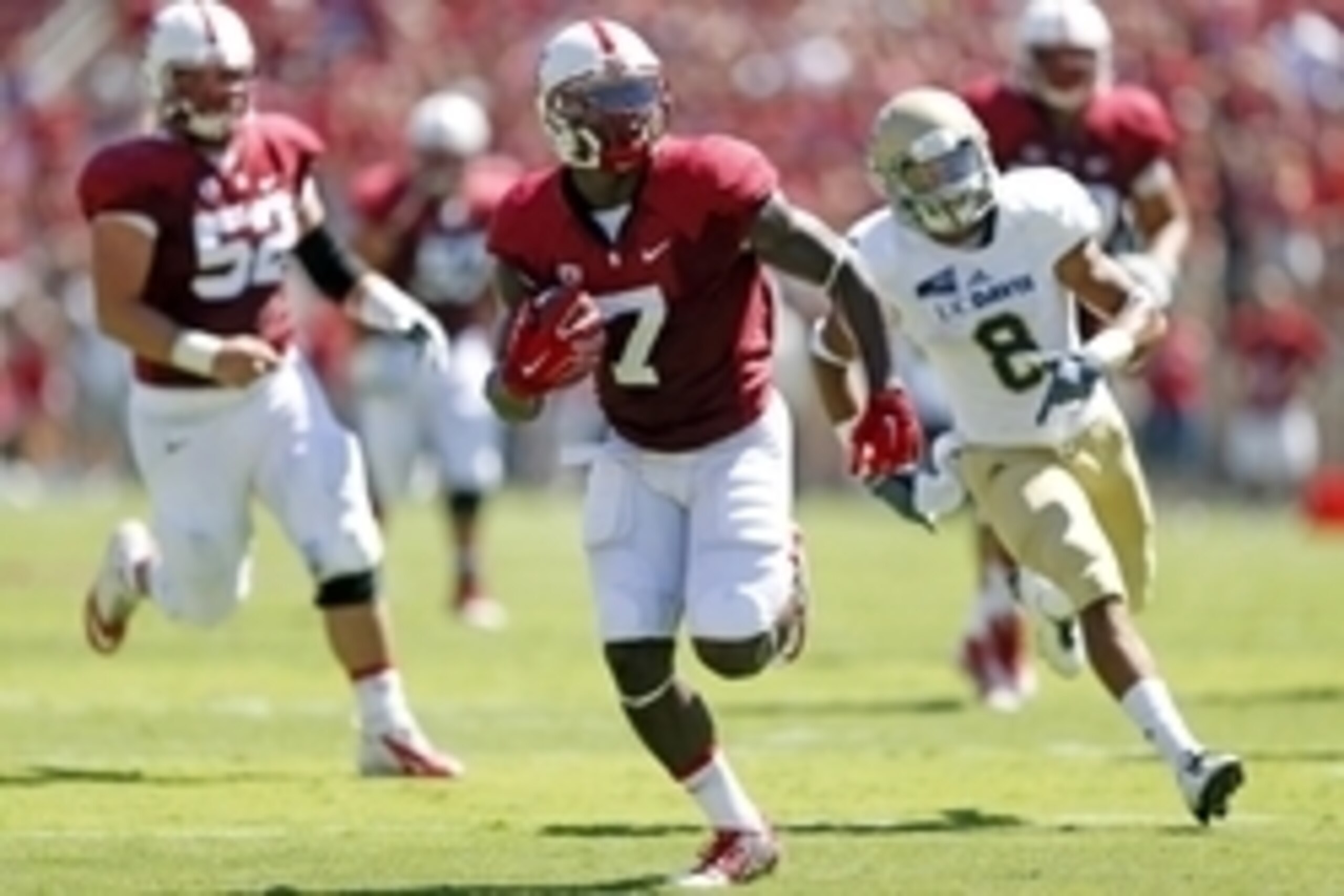 Aug 30, 2014; Stanford, CA, USA;Stanford Cardinal wide receiver Ty Montgomery (7) runs for a 44 yard touchdown during the second quarter against the UC Davis Aggies at Stanford Stadium. Mandatory Credit: Bob Stanton-USA TODAY Sports Aug 30, 2014; Stanford, CA, USA;Stanford Cardinal wide receiver Ty Montgomery (7) runs for a 44 yard touchdown during the second quarter against the UC Davis Aggies at Stanford Stadium. Mandatory Credit: Bob Stanton-USA TODAY Sports