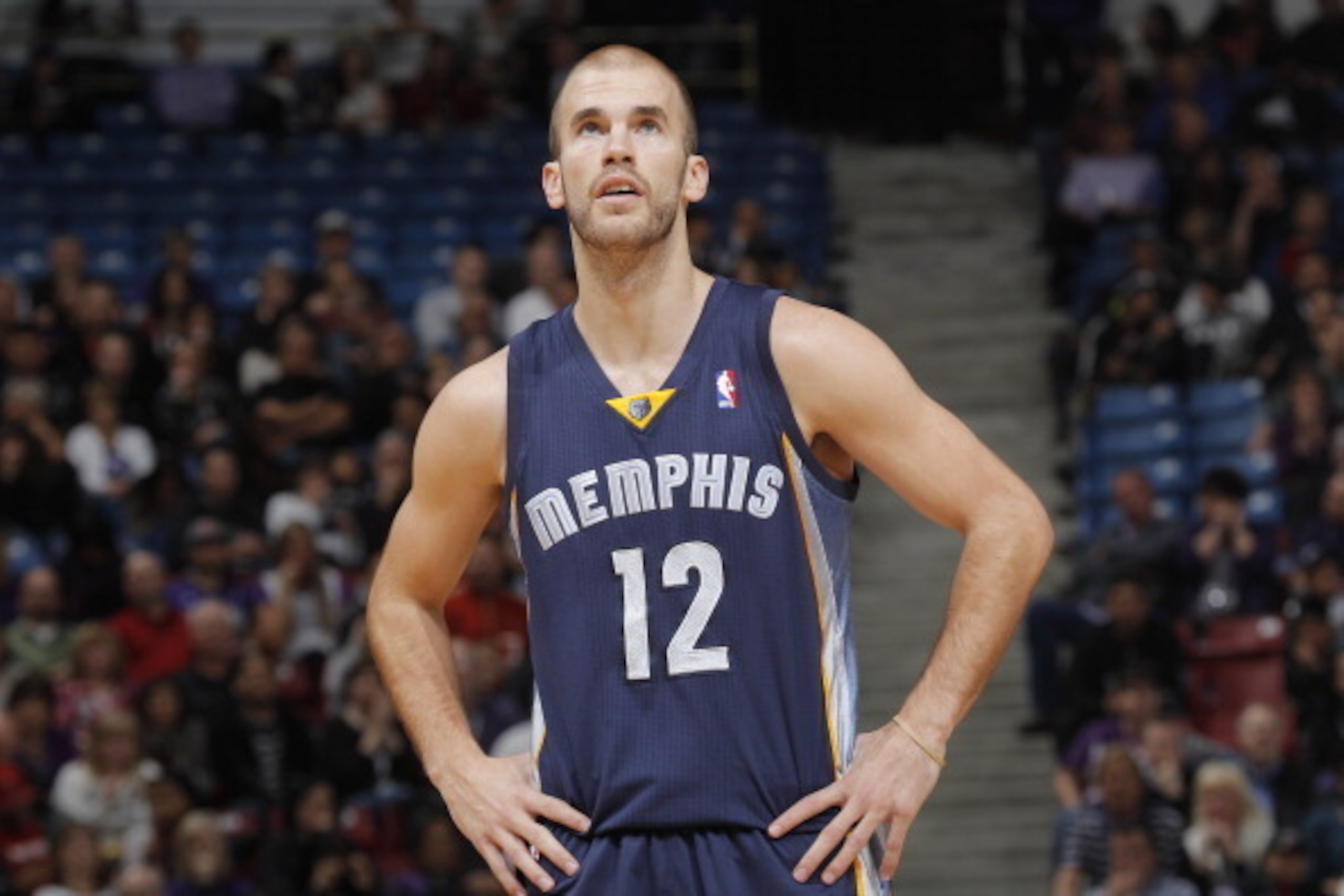 SACRAMENTO, CA - JANUARY 29: Nick Calathes #12 of the Memphis Grizzlies in a game against the Sacramento Kings on January 29, 2014 at Sleep Train Arena in Sacramento, California. NOTE TO USER: User expressly acknowledges and agrees that, by downloading an SACRAMENTO, CA - JANUARY 29: Nick Calathes #12 of the Memphis Grizzlies in a game against the Sacramento Kings on January 29, 2014 at Sleep Train Arena in Sacramento, California. NOTE TO USER: User expressly acknowledges and agrees that, by downloading an