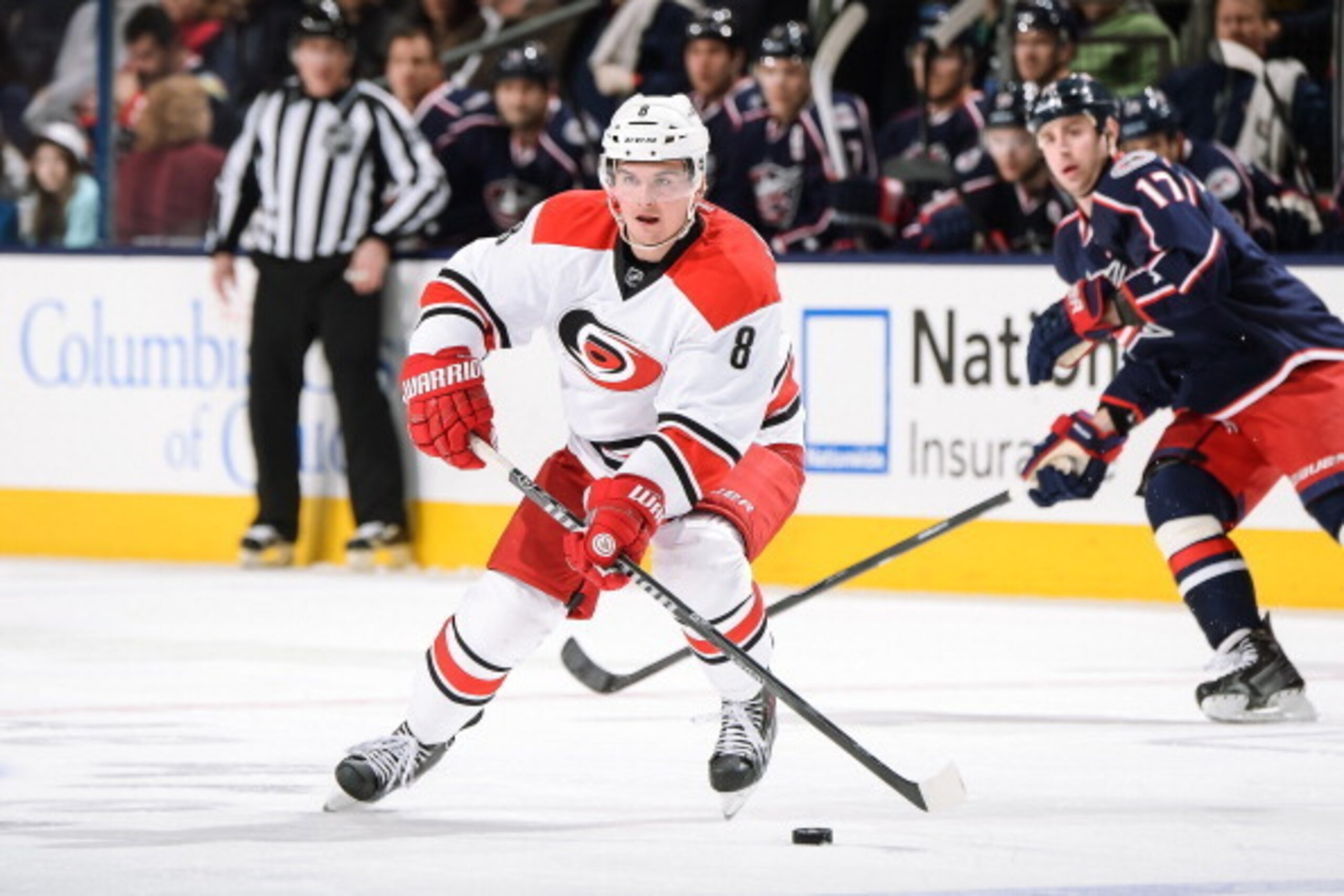 COLUMBUS, OH - MARCH 18:  Andrei Loktionov #8 of the Carolina Hurricanes skates with the puck against the Columbus Blue Jackets on March 18, 2014 at Nationwide Arena in Columbus, Ohio.  (Photo by Jamie Sabau/NHLI via Getty Images)