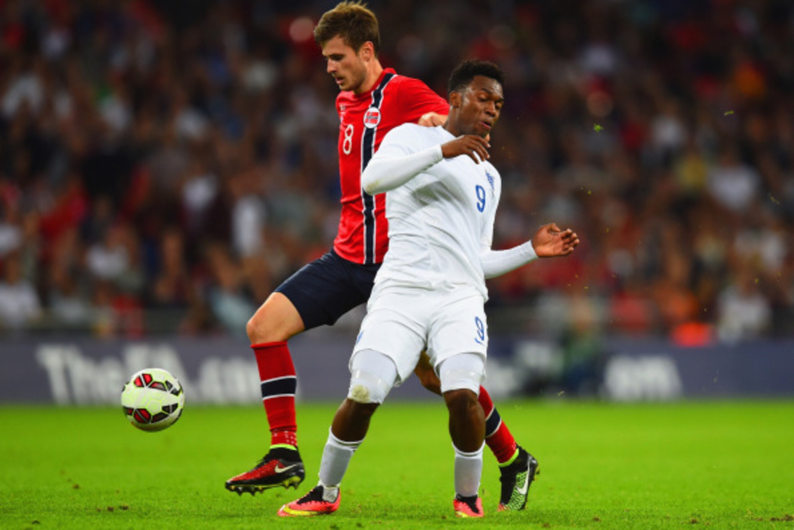 LONDON, ENGLAND - SEPTEMBER 03:  Havard Nordtveit of Norway (L) controls the ball next to Daniel Sturridge of England during the International friendly match between England and Norway at Wembley Stadium on September 3, 2014 in London, England.  (Photo by