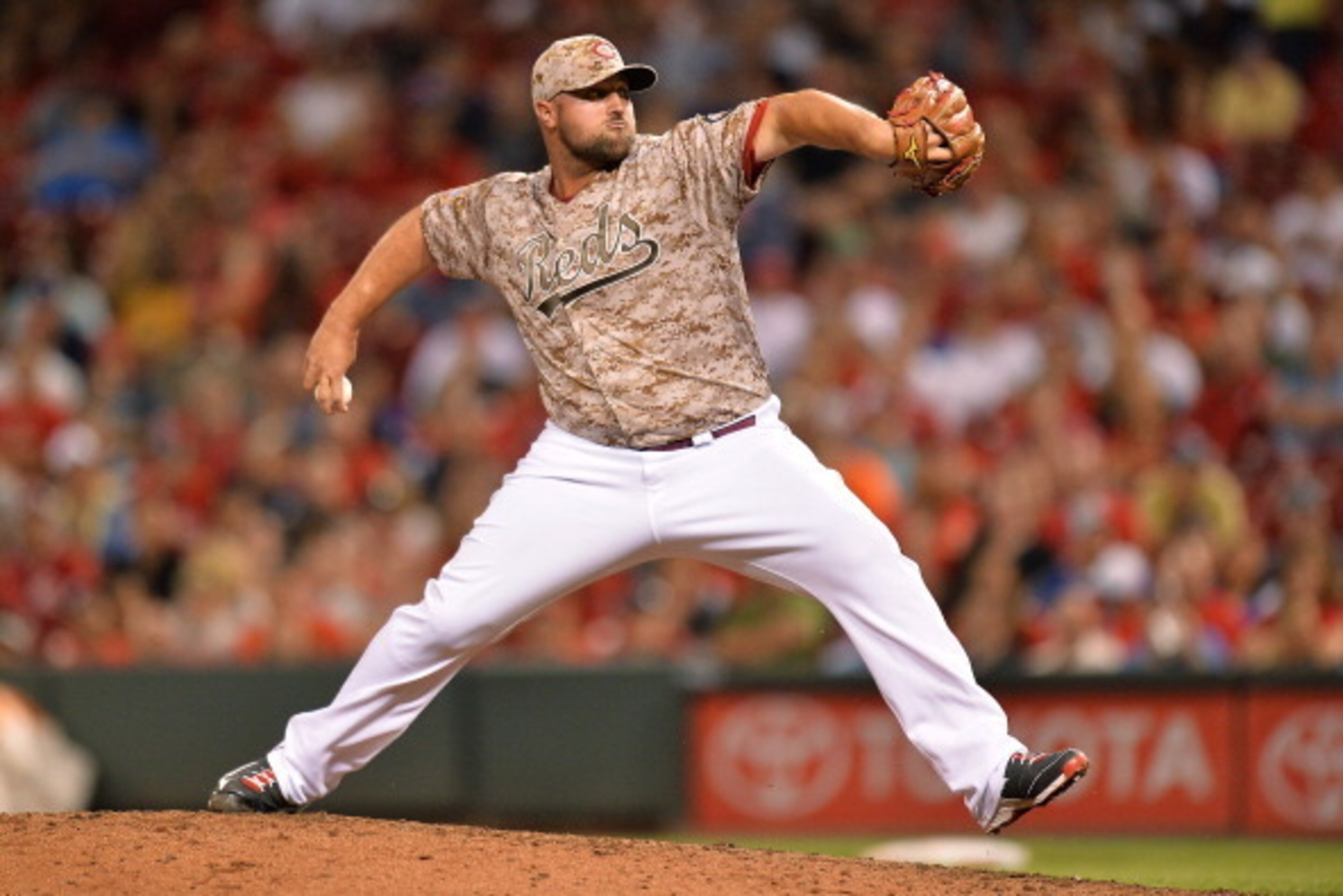 CINCINNATI, OH - JUNE 11:  Jonathan Broxton #51 of the Cincinnati Reds pitches in the seventh inning against the Los Angeles Dodgers at Great American Ball Park on June 11, 2014 in Cincinnati, Ohio. Cincinnati shut out Los Angeles 5-0.  (Photo by Jamie Sa