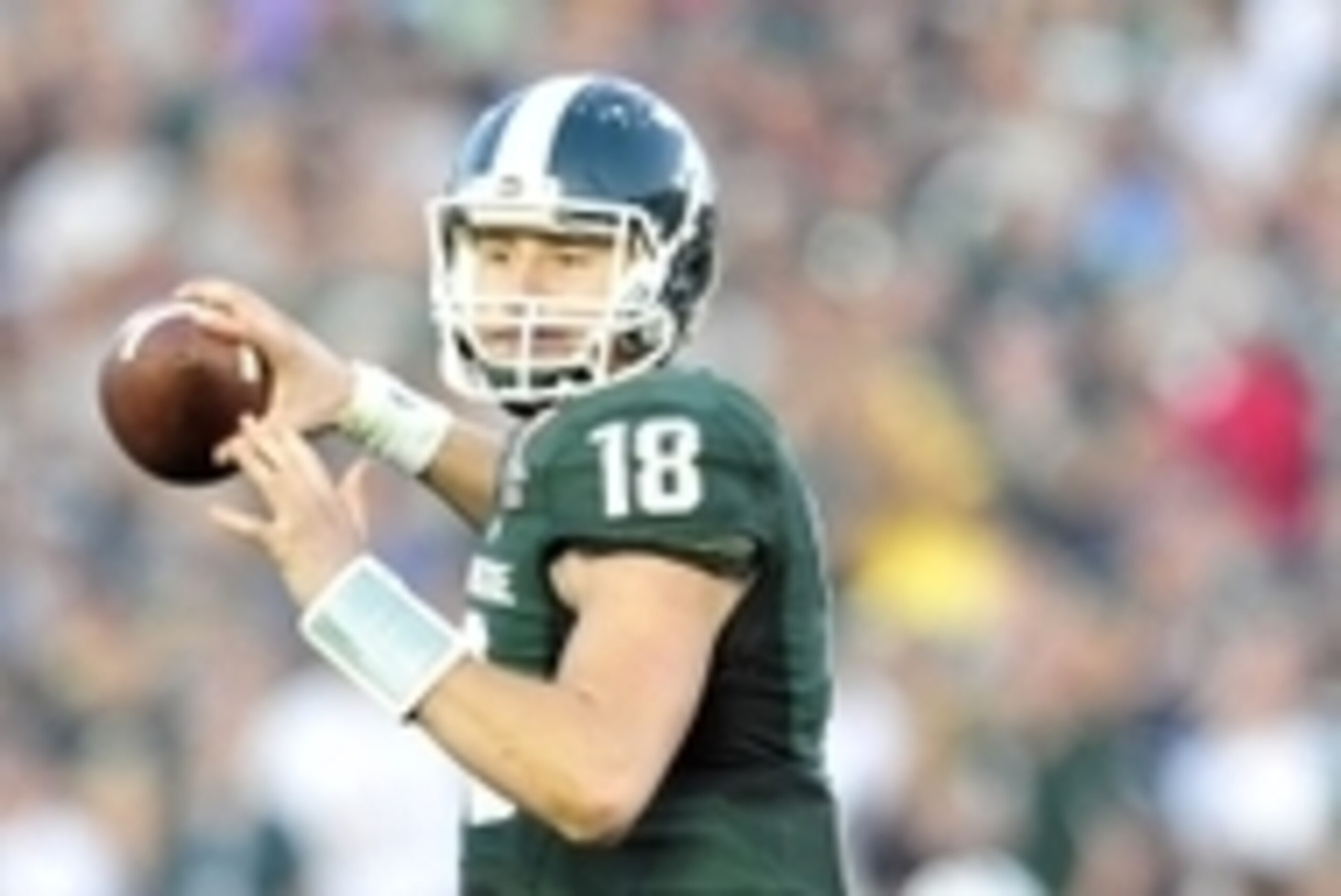 January 1, 2014; Pasadena, CA, USA; Michigan State Spartans quarterback Connor Cook (18) passes the ball against the Stanford Cardinal during the second half at Rose Bowl. Mandatory Credit: Gary A. Vasquez-USA TODAY Sports
