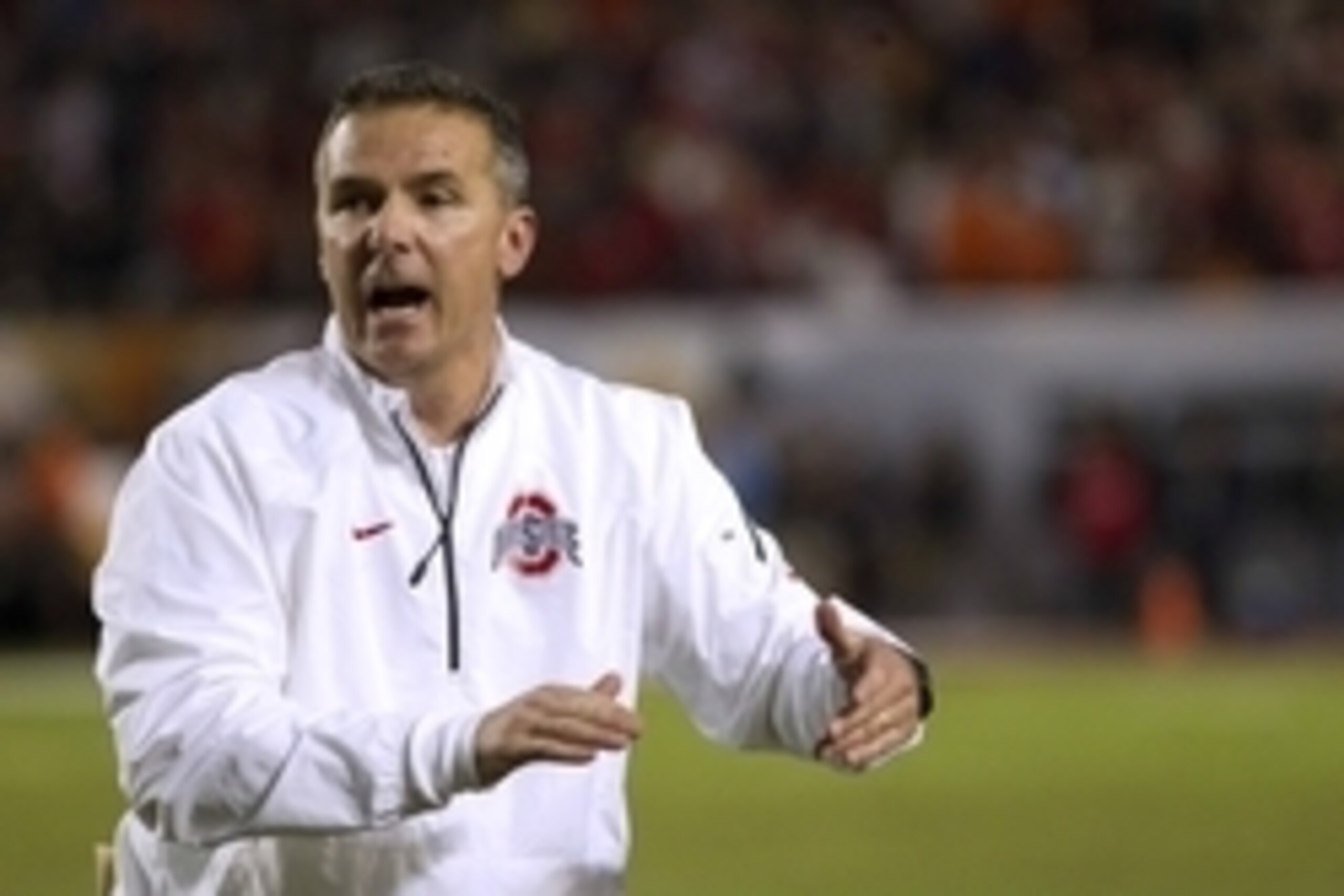 Jan 3, 2014; Miami Gardens, FL, USA; Ohio State Buckeyes head coach Urban Meyer reacts during the first half in the 2014 Orange Bowl college football game against the Clemson Tigers at Sun Life Stadium. Mandatory Credit: Joshua S. Kelly-USA TODAY Sports