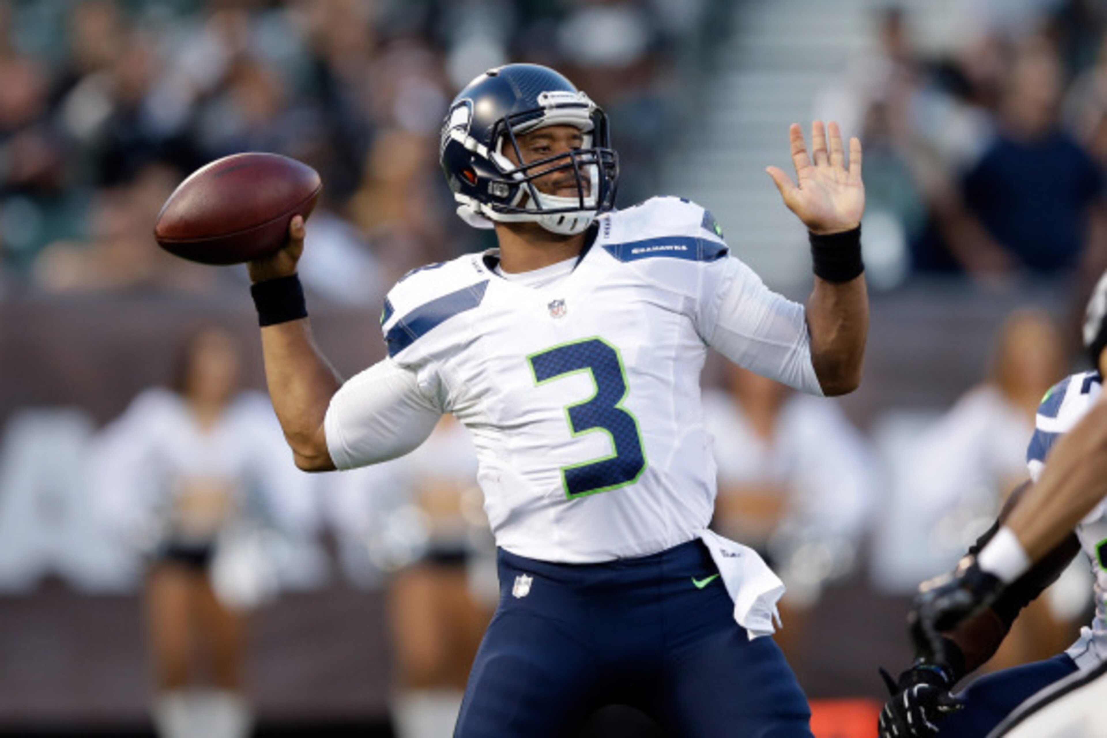 OAKLAND, CA - AUGUST 28: Quarterback Russell Wilson #3 of the Seattle Seahawks in action against the Oakland Raiders at O.co Coliseum on August 28, 2014 in Oakland, California. (Photo by Ezra Shaw/Getty Images) OAKLAND, CA - AUGUST 28: Quarterback Russell Wilson #3 of the Seattle Seahawks in action against the Oakland Raiders at O.co Coliseum on August 28, 2014 in Oakland, California. (Photo by Ezra Shaw/Getty Images)