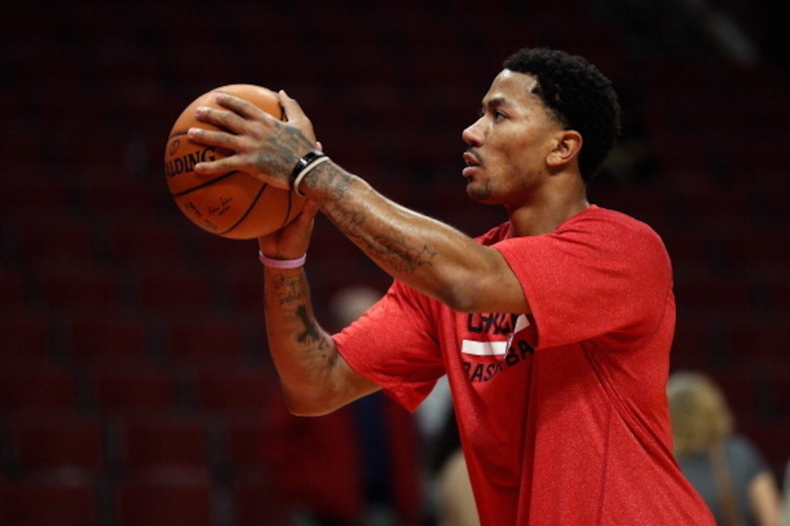 CHICAGO, IL - FEBRUARY 11:  Derrick Rose #1 of the Chicago Bulls, who suffered a season-ending knee injury in November, practices his shooting before the Bulls take on the Atlanta Hawks at the United Center on February 11, 2014 in Chicago, Illinois. NOTE 
