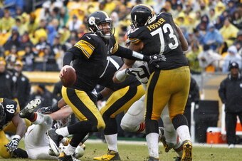 PITTSBURGH, PA - DECEMBER 29:  Ben Roethlisberger #7 of the Pittsburgh Steelers scrambles out of the pocket against the Cleveland Browns during the game on December 29, 2013 at Heinz Field in Pittsburgh, Pennsylvania.  The Steelers defeated the Browns 20-