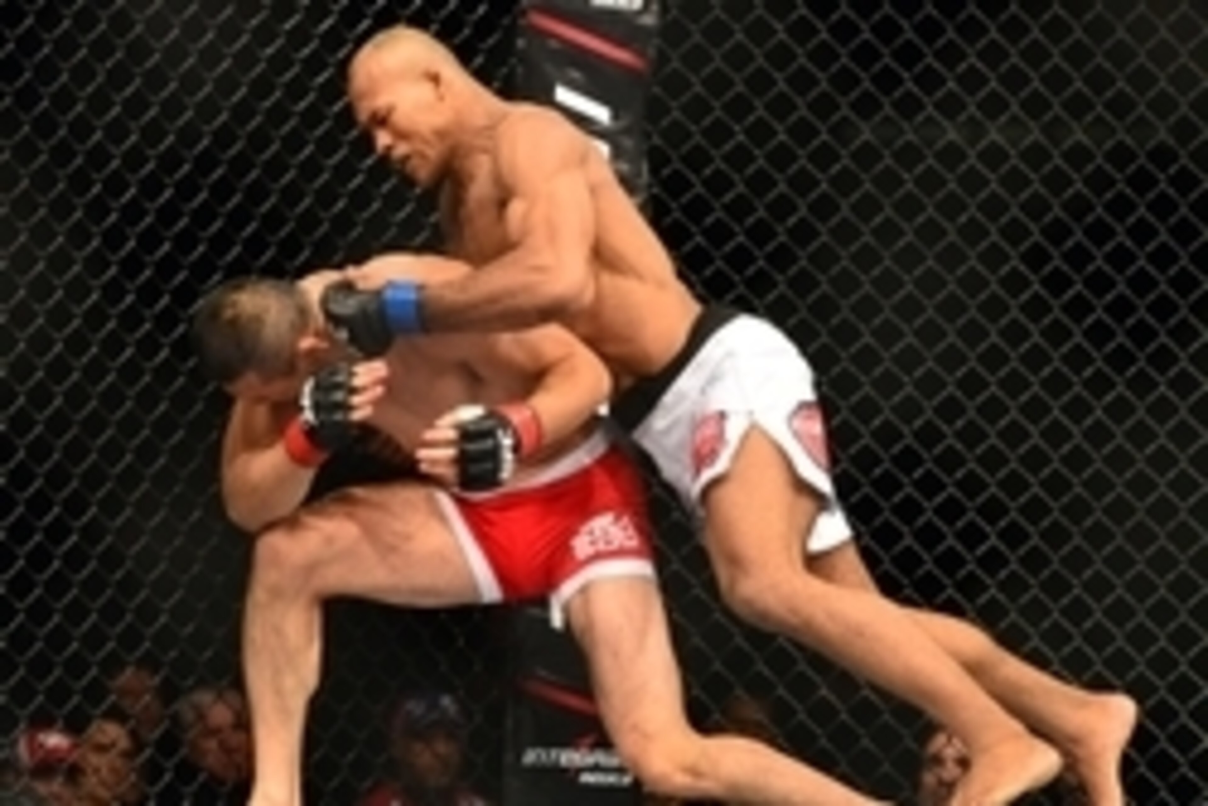 Sep 4, 2013; Belo Horizonte, BRAZIL;  Yushin Okami (red shorts) fights against Ronaldo Jacare Souza during UFC Fight Night at Mineirinho Arena. Mandatory Credit: Jason Silva-USA TODAY Sports