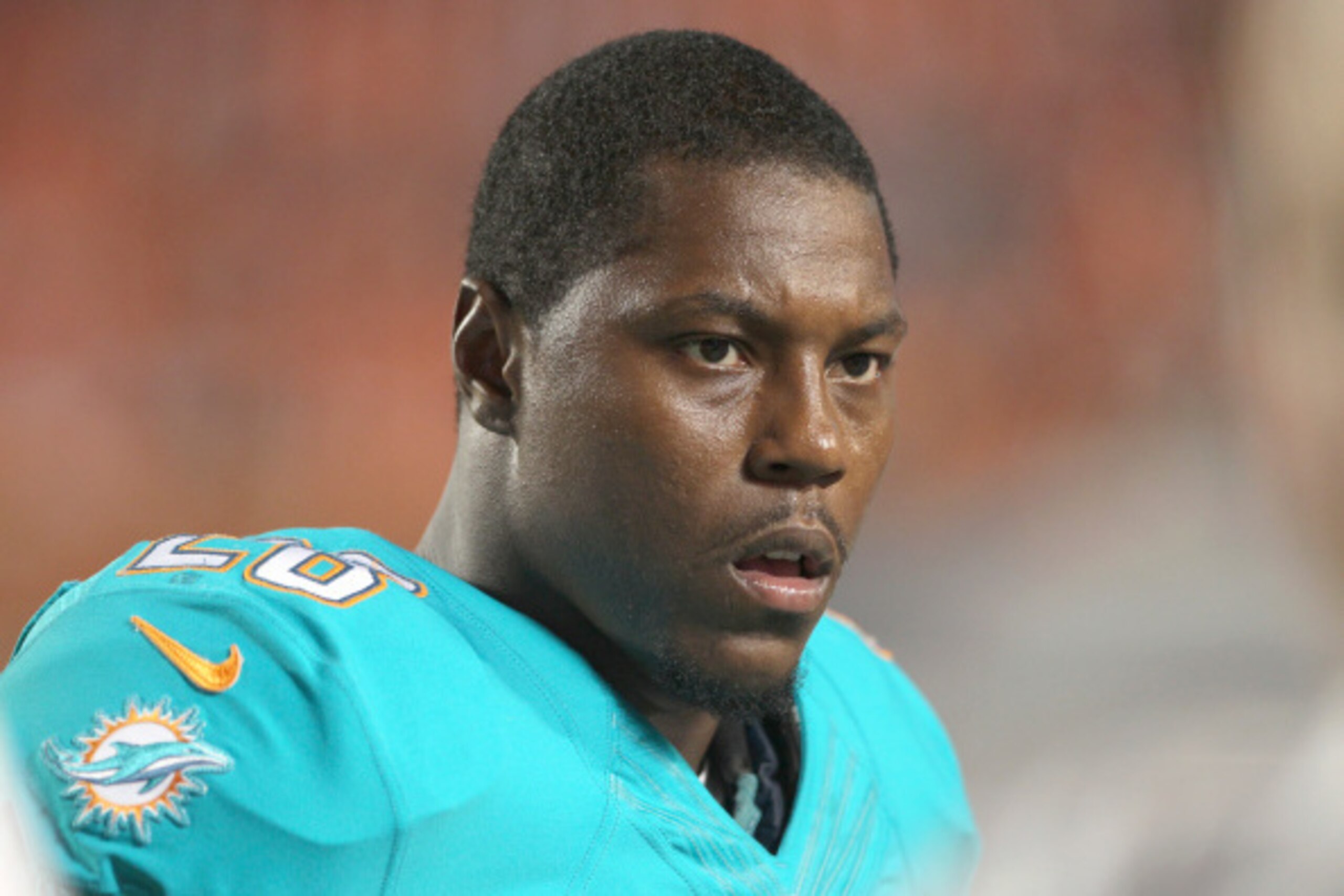 MIAMI GARDENS, FL - AUGUST 28:  Knowshon Moreno #28 of the Miami Dolphins looks on in the fourth quarter during action against the St. Louis Rams at Sun Life Stadium on August 28, 2014 in Miami Gardens, Florida.  (Photo by Marc Serota/Getty Images)