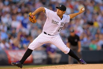 DENVER, CO - AUGUST 20:  Starter Jorge De La Rosa #29 of the Colorado Rockies pitches during the second inning against the Kansas City Royals at Coors Field on August 20, 2014 in Denver, Colorado. (Photo by Justin Edmonds/Getty Images)