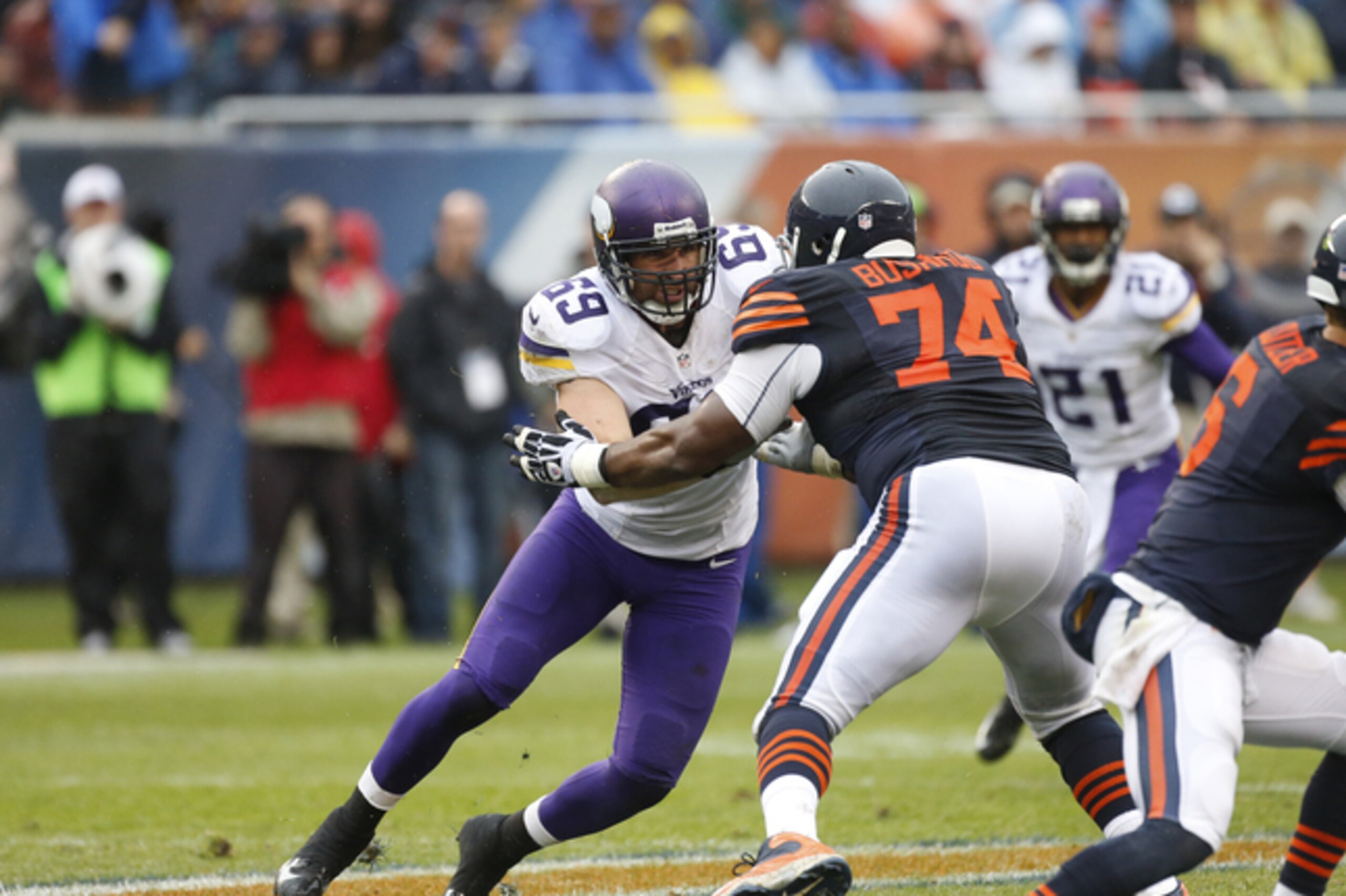 Bushrod battles new teammate Jared Allen in 2013