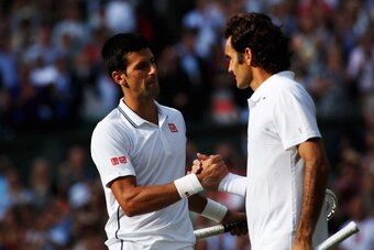 LONDON, ENGLAND - JULY 06:  Novak Djokovic of Serbia shakes hands with Roger Federer of Switzerland after their Gentlemen's Singles Final match on day thirteen of the Wimbledon Lawn Tennis Championships at the All England Lawn Tennis and Croquet Club on J