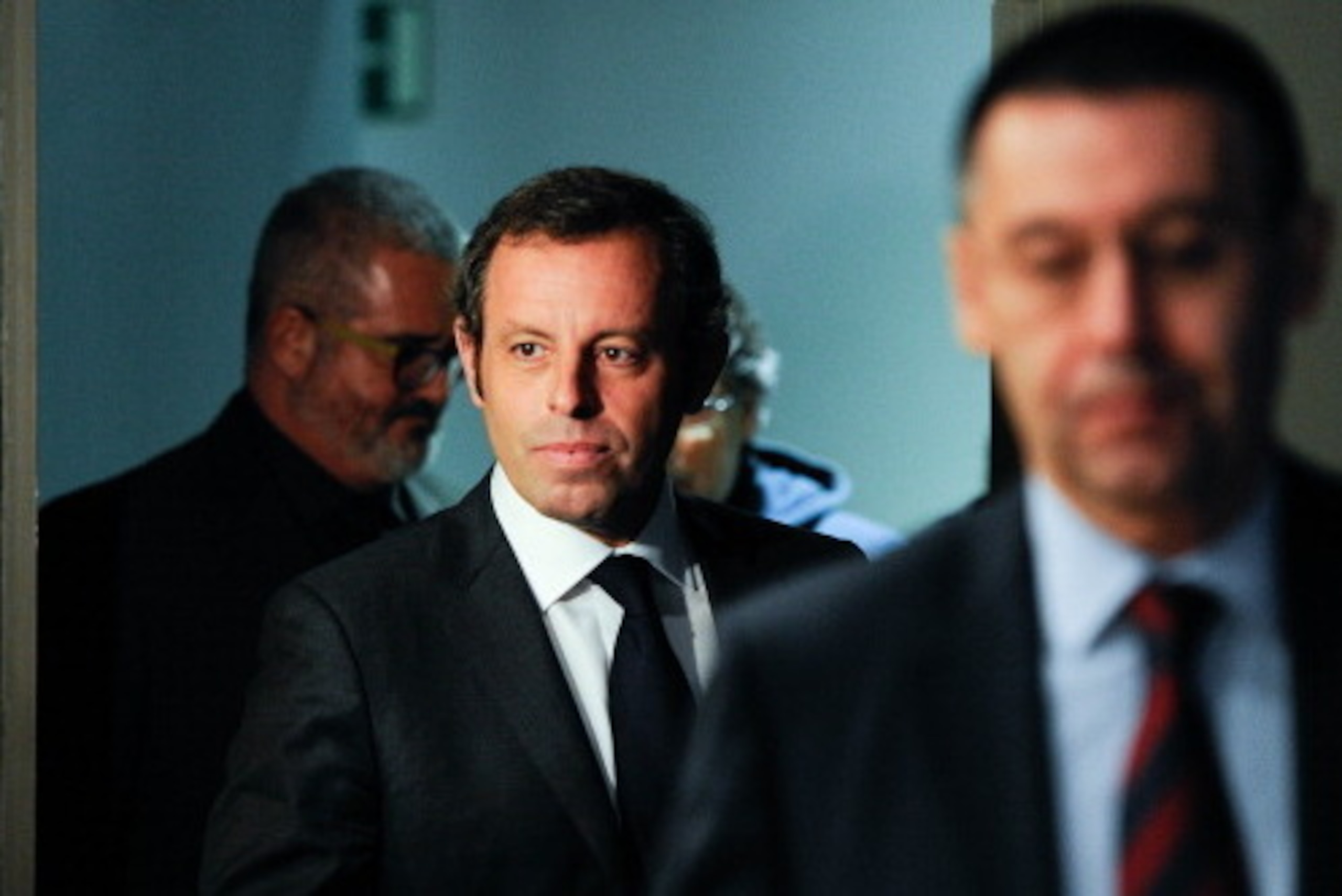 BARCELONA, SPAIN - JANUARY 23: FCB President Sandro Rosell (L) and FCB Vice-President Josep Maria Bartomeu arrives to the press conference announcing his resgination as FCB president on January 23, 2014 in Barcelona, Spain. FCB President Sandro Rosell is 