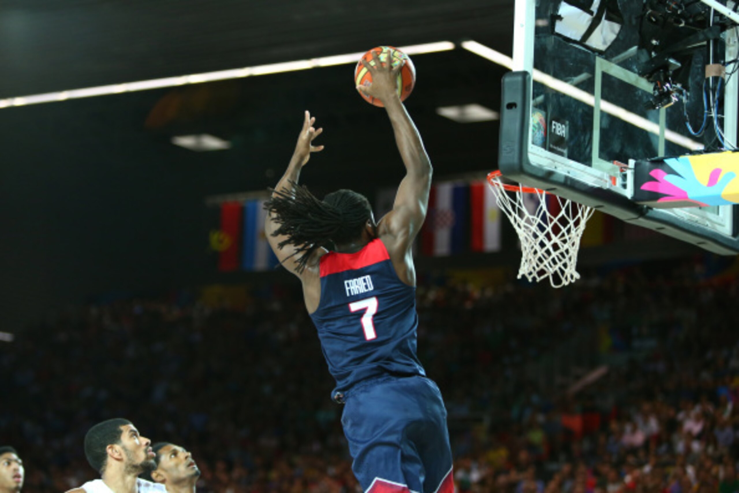 BILBAO, SPAIN - SEPTEMBER 3: Kenneth Faried #7 of the USA Basketball Men's National Team goes up to dunk during a game against the Dominican Republic Basketball Men's National Team during the 2014 FIBA World Cup at Bizkaia Arena in Bilbao Exhibition Centr