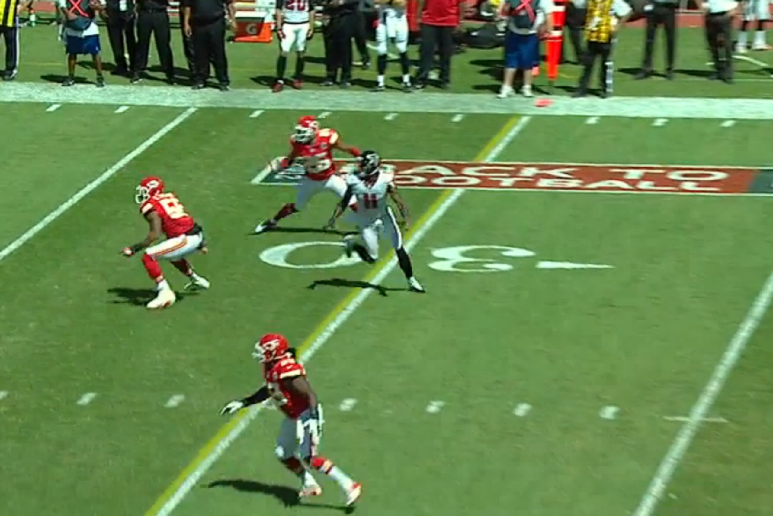 Romeo Crennel's loose Cover 2 structure is wide open between the linebackers and safeties.