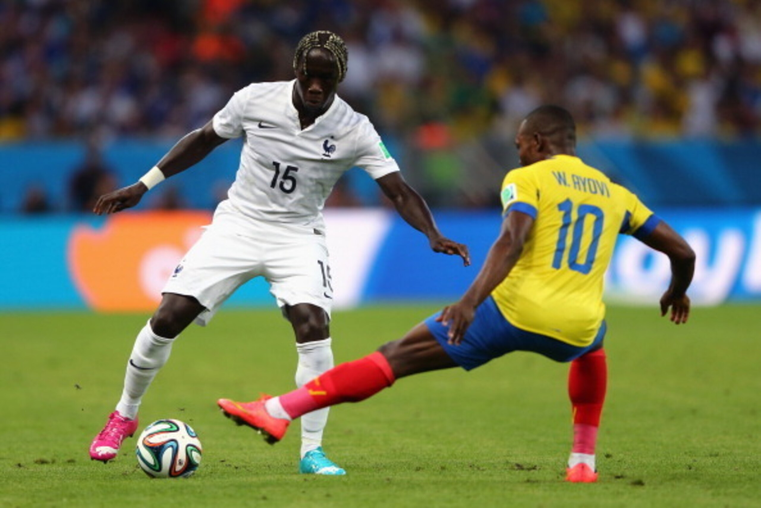 RIO DE JANEIRO, BRAZIL - JUNE 25: Bacary Sagna of France controls the ball against Walter Ayovi of Ecuador during the 2014 FIFA World Cup Brazil Group E match between Ecuador and France at Maracana on June 25, 2014 in Rio de Janeiro, Brazil. (Photo by Ja RIO DE JANEIRO, BRAZIL - JUNE 25: Bacary Sagna of France controls the ball against Walter Ayovi of Ecuador during the 2014 FIFA World Cup Brazil Group E match between Ecuador and France at Maracana on June 25, 2014 in Rio de Janeiro, Brazil. (Photo by Ja